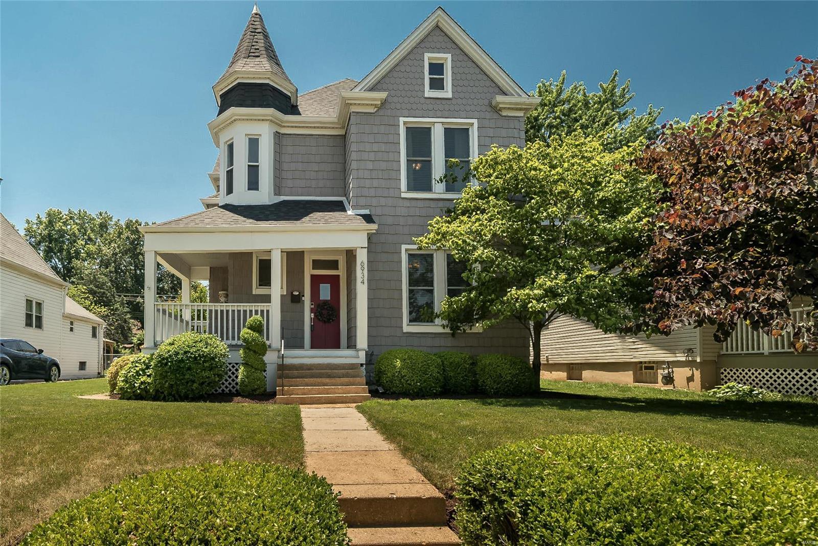 Beautiful South City Victorian home in a great location. Lindenwood park is down the street. The wonderful landscaping and inviting wrap around front porch welcome you in. The entry foyer leads you to the spacious living room w/ original trim work & oak hardwood floors flowing into the separate dining room. The updated eat-in kitchen has a beautiful center island, granite counter tops, custom cabinetry. The main floor laundry is awesome. The adjacent family room offers additional living space with a door leading to the fabulous outside area. You will love the gazebo, huge deck for entertaining. The main floor bedroom / office has updated full bath. Upstairs you will find a fun exercise room, nice size bedroom, updated hall bath, attractive master bedroom suite separate shower & jacuzzi tub. Closet organizers in the bedroom closets is a wonderful addition. Lower level is large, plenty of storage. Newer roof, gutters&flashing just a few of the wonderful updates this stunning home offers.