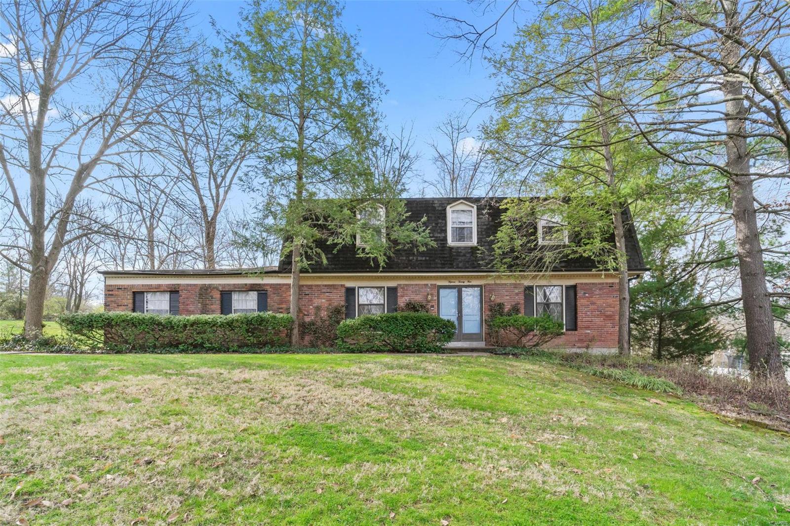 LOCATION, LOCATION, LOCATION!!! Sitting on a short & peaceful cul-de-sac street in sought after Kirkwood School District, this 2-story, 4 bed, 2.5 bath, w/ 2,300+ sq ft home won't last long. Backing to trees/wooded area this home offers over 1/2 acre private lot which is the perfect space for gardening, hosting friends & family over for a summer BBQ, or simply sitting down & enjoying the peaceful scenery. Inside you will find oakwood floors throughout, spacious living space, kitchen & bedrooms making this home a must see for a buyer looking to update their next home with their desired finishes. Additional features: 2-Car oversized garage, main floor laundry, wood burning fireplace, close proximity to Downtown Kirkwood, Kirkwood High School, Kirkwood Park, access I-270, Dierbergs, West County Mall & numerous restaurants. Being Sold As-Is, seller to make no repairs. Don't miss this rare opportunity, Schedule your appointment today!