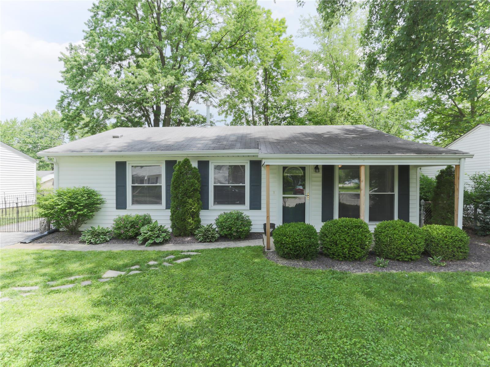 Charming Ranch home w/ 3 bedrooms, 1 bath and Main floor laundry! This home has so much to offer! You will fall in love with the beautifully manicured home as soon as you pull up. There is professional landscaping, and plenty of parking. There is an additional pad at the drive way and in the back of the driveway. Walking into the home, you will Love the space and the space that is offered! There is a large living room that has 5 1/4 trim, newer windows throughout. There is pergo flooring in the living room and the breakfast room. The open kitchen features updated cabinets, a tile backsplash, newer appliances, ceramic flooring and a HUGE pantry.The home has 3 bedrooms, 2 with engineered wood flooring and 1 with carpet. There is a laundry area in the hall way and a utility closet. The full bath has been nicely updated. Making your way outside the home has a storage space that is built into the home and the Beautiful back yard is spacious and private Seller is leaving the shed as well.