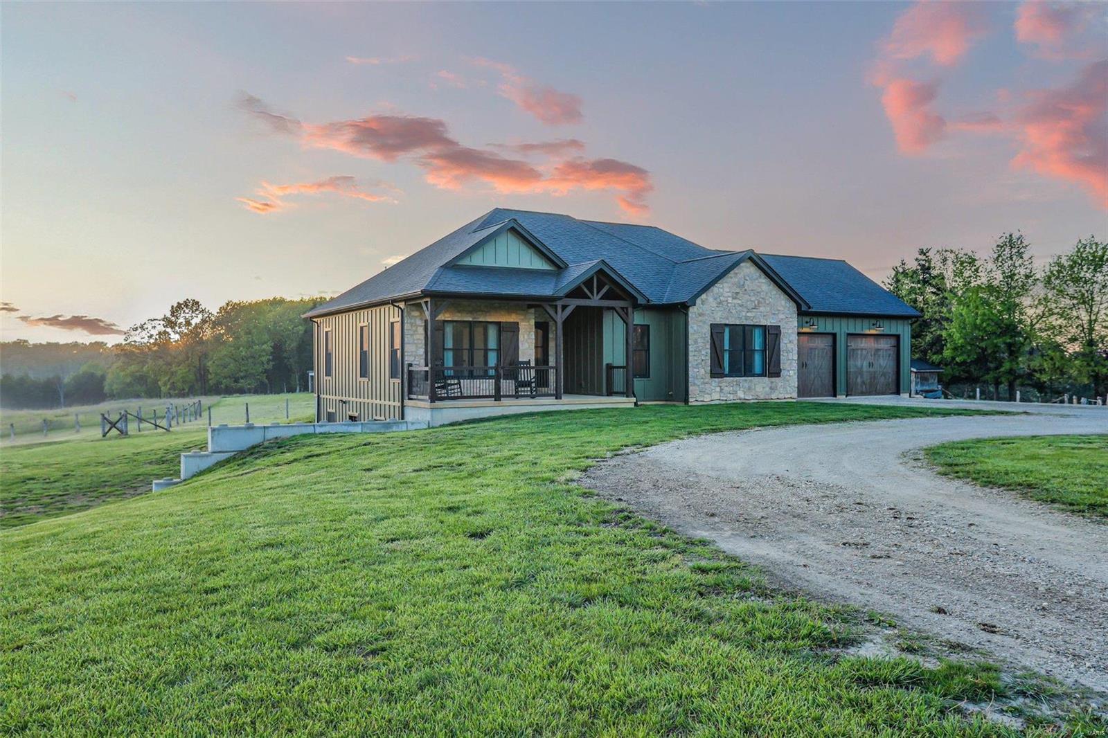 Escape the hustle and bustle with your very own slice of country paradise! Nestled on just under 7 serene acres, this charming custom ranch home offers endless possibilities. Whether you dream of cultivating your own mini-farm, enjoying peaceful evenings under starlit skies, or simply savoring the tranquility of rural living, this property is your canvas. Embrace the beauty of nature and create your own idyllic retreat. This home offers character and charm around every turn, with stunning knotty alder cabinets, center island, and walk-in pantry. Warm wood beams and timeless stone accents throughout. Sunrises and Sunset straight out of a magazine! This home has a full walk-out basement that is a perfect layout for a 3rd bedroom and entertaining space. Master suite features spacious double vanity and custom tile walk-in shower. Andersen 200 Series Windows. Chicken Coop already in place. Plenty of fencing throughout the grounds. 400-amp service. Tornado Room under the front porch.