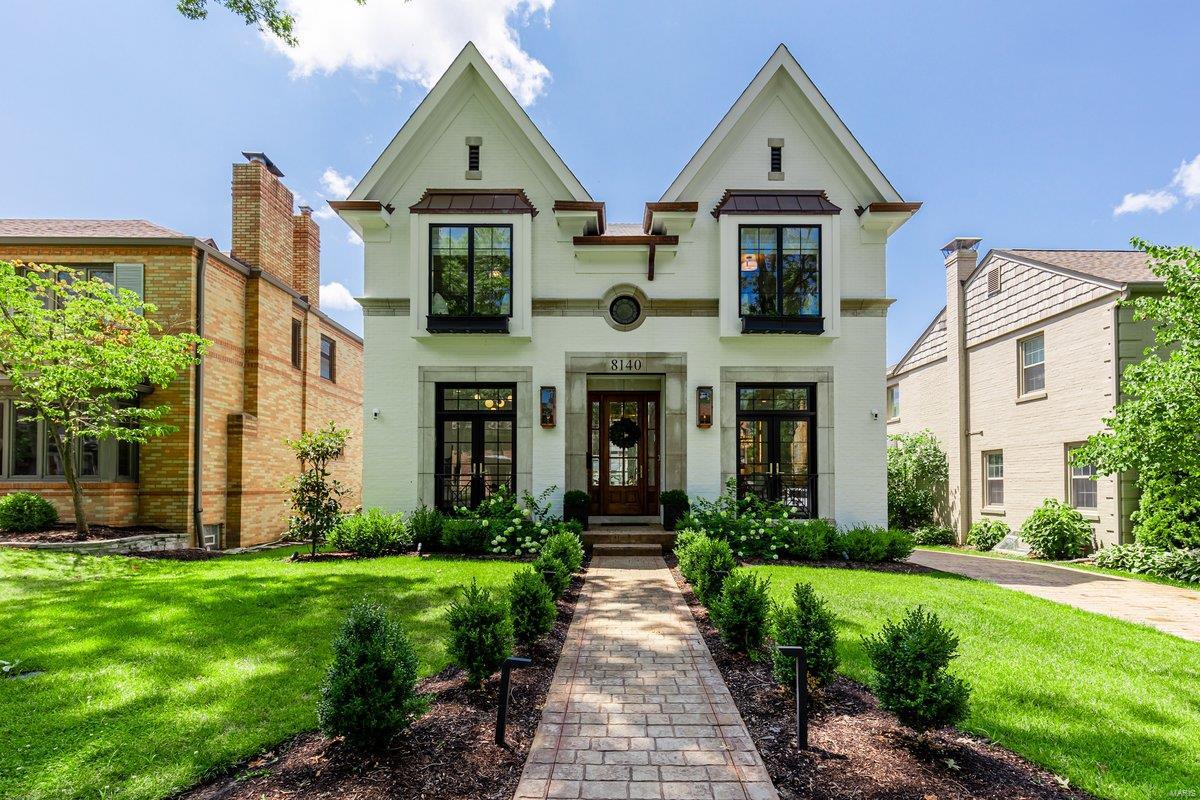 This stunning 3 year-old home in the heart of Clayton Gardens is a masterpiece of modern living. As you step inside, you're greeted by a flood of natural light. The main floor boasts a dining area, office/den, half bath, a graciously sized living room with a gorgeous coffered ceiling, & a gourmet chef's kitchen complete with a butler's pantry, wine cooler, & large walk-in pantry. The second floor features a luxurious primary suite with expansive bathroom & spacious walk-in closet with a sink & coffee station, a laundry room & two additional bedrooms share a Jack & Jill bathroom. The lower level offers an additional 1,200 square feet of living space, including a rec area, wet bar, full bath with steam shower, bedroom, & ample storage. For convenience there is an elevator that runs to all three floors. The charming exterior includes a new patio and landscaping. The 2 car garage has flex space above that can be converted for various uses. This home is the epitome of luxury and comfort.