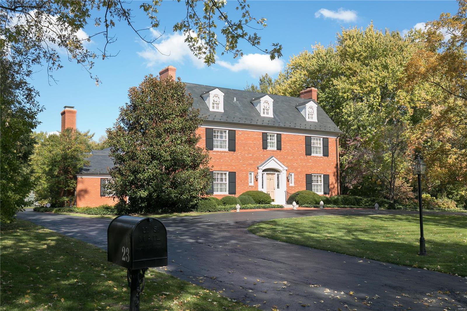 In the heart of Ladue, this elegant 3-story all brick home is being offered for the 1st time in 45 years. On an idyllic .849 level lot in charming Clermont, with 5 beds, 3 full & 2 half baths & 4,479 sq ft, the home boasts a newer slate roof, hardwood floors & beautiful millwork throughout. The traditional center hall plan opens to a cozy study with fireplace as well as living room with 2nd fireplace, adjoining dining room & sunroom overlooking secluded, lushly landscaped backyard. The kitchen with Subzero, Dacor & Asko appliances leads to family room addition with wet bar & 3rd  fireplace all designed by noted architect Crosby Brown & built by Markway. On the 2nd floor is the primary bedroom with renovated bath, sitting room & separate walk-in closet, hall bath & additional bedroom. The 3rd floor has two delightful bedrooms with bath. Finished LL rec room, ½ bath, laundry & storage. Plus 3 car garage with finished bonus space above. Move right in or take this home to the next level! Additional Rooms: Sun Room