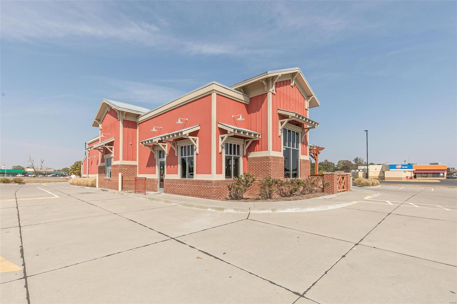 Located on the street with the highest traffic count in town! This location and building are perfect for a national or regional franchise location or private company. There is seating for 40 inside, plus a covered patio outside, and a drive-through window for added revenue potential and customer convenience. Priced below a recent appraisal. Owner is licensed Missouri Realtor Location: High Traffic