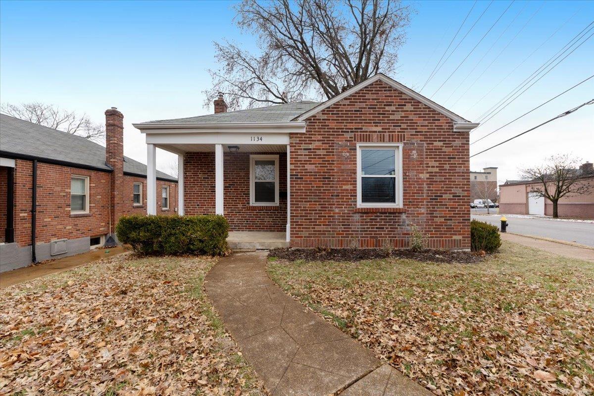 This adorable 2-bed, 1-bath ranch-style home in the heart of Clayton-Tamm is just a short walk to all your Dogtown favorites such as Heavy Riff Brewery, Felix's Pizza, and the Stone Turtle. Inside, you'll find dark red oak hardwood floors that flow seamlessly through the spacious living room, dining room, and both bedrooms. The updated kitchen is a chef's dream, featuring stunning granite countertops, custom cabinetry, soft-close drawers, and sleek stainless steel appliances. The bathroom has been thoughtfully updated and comes with a lifetime Bath Fitters warranty. The full basement provides ample storage space, while the fenced-in backyard is perfect for relaxing or entertaining. With a prime location, modern updates, and cozy charm, this home is an ideal choice for those seeking comfort and convenience in one of St. Louis' most desirable neighborhoods.