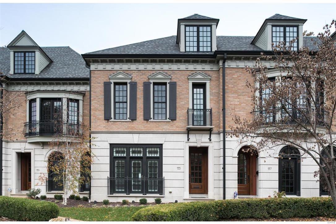 This remarkable Georgian style town home built just 14 years ago is designed w/high quality finishes inside and out. It includes 4 bedrooms and 3.5 baths in approx 3447 sq ft on 2.5 stories. Features begin w/10ft ceilings, extensive ceiling & wall crown moldings, plantation shutters and custom mill work throughout. Signature: Gourmet kitchen featuring a Wolf gas cook top w/front controls, granite counters, breakfast bar & pendant lights. The luxurious master suite is private from the secondary bedrooms. It is highlighted by a whirlpool tub, separate walk-in shower and walk-in closet with organizers. The third floor has great natural light and opens to a family rm & 4th bedroom area. Enjoy your own private patio & garden area outside the hearth room. Lower level storage and utility room also includes space for elevator and two spacious underground secured parking spaces. Walk into the heart of Clayton for restaurants, shops & grocery. New 2017 Tax Bill: $12,920.00