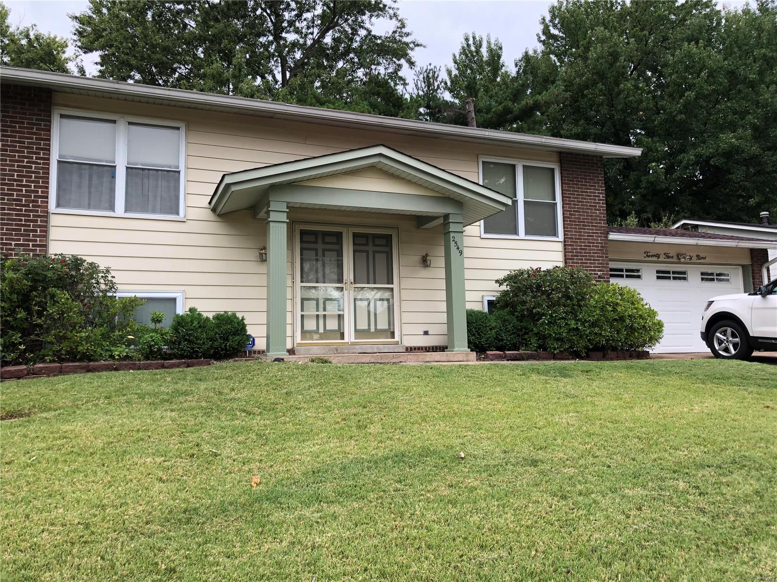UPDATED 3 BEDROOMS , 2 FULL BATHROOM,  2 CAR GARAGE, FULL LOWER LEVEL, WALK-OUT SPLIT HOUSE LOCATED IN THE WESGLEN ESTATE SUBDIVISON. Step into the foyer with a couple of steps you are on the main level. To the right feature a nice size living room with big window and carpet flooring. It opens to the formal dining room and updated kitchen. The kitchen has updated wood cabinets, stainless steel appliances, ceramic flooring, sink with window over to watch kids playing and granite counter top. Sliding door from the dining room opens to the deck. To the left of the main level are 2 nice sized bedrooms with wood flooring a full updated bathroom. The walk-out lower level feature 3rd bedroom, full bathroom storage are and family room. Lots of large size windows in rooms let the light in . 2 car attached garage with opener. updated hvac, electrical panel, furnace , and roof . PATIO. DECK FENCED IN YARD.