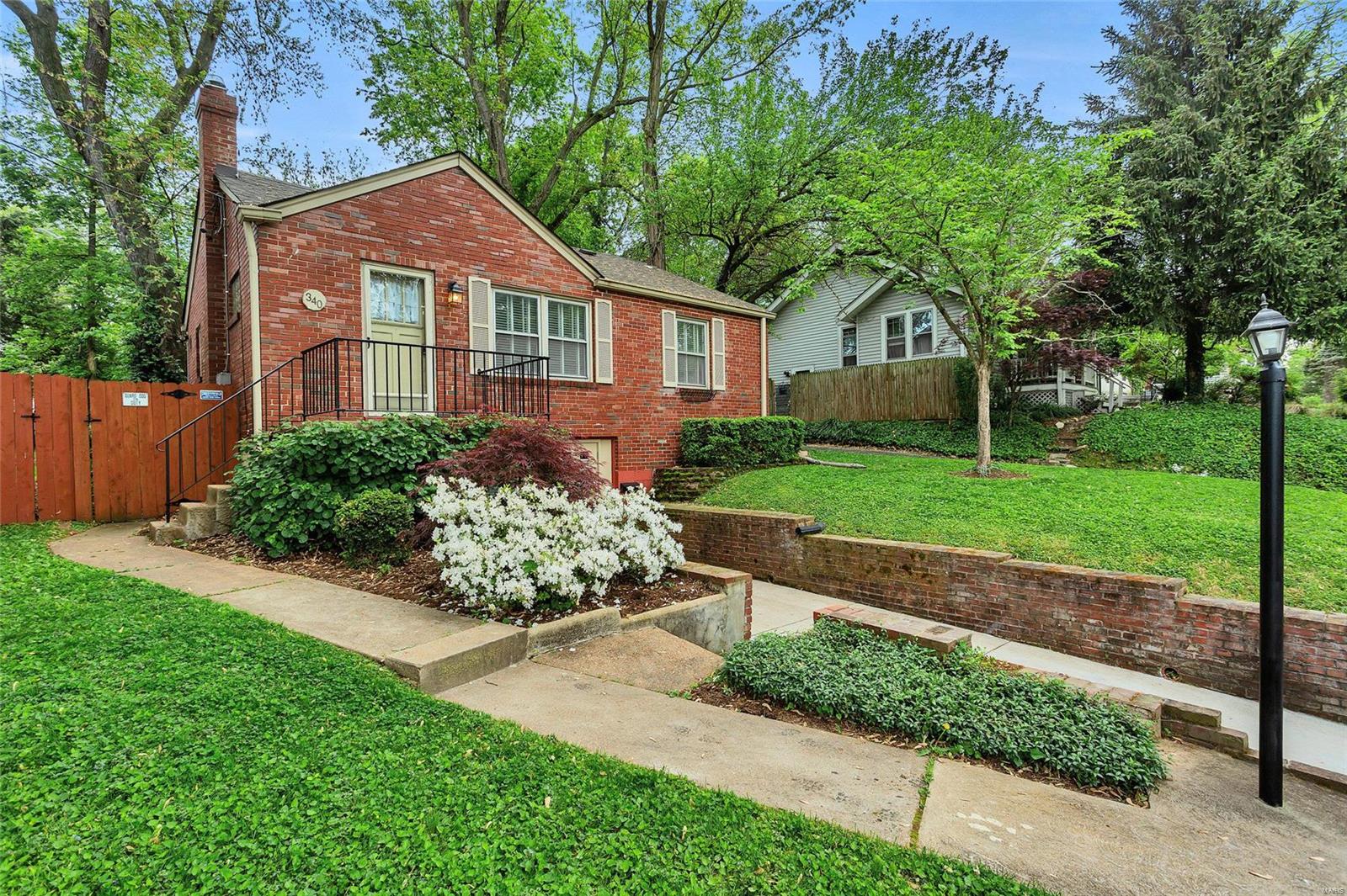 Great opportunity to own a nicely updated brick bungalow in Tuxedo Park. This charming 2 bedroom 1 bath home has just been freshly painted and features newly refinished hardwood floors.  The main floor has a great open floor plan with large living room, dining room and kitchen with white cabinets and granite counter tops.  There are also 2 nice sized bedrooms and a full bath.  
The lower level provides more living space with a rec room and office.  Outside you will find a large deck and fenced yard.  340 Atalanta is walking distance to schools, Old Orchard and the newly renovated Glen Park.