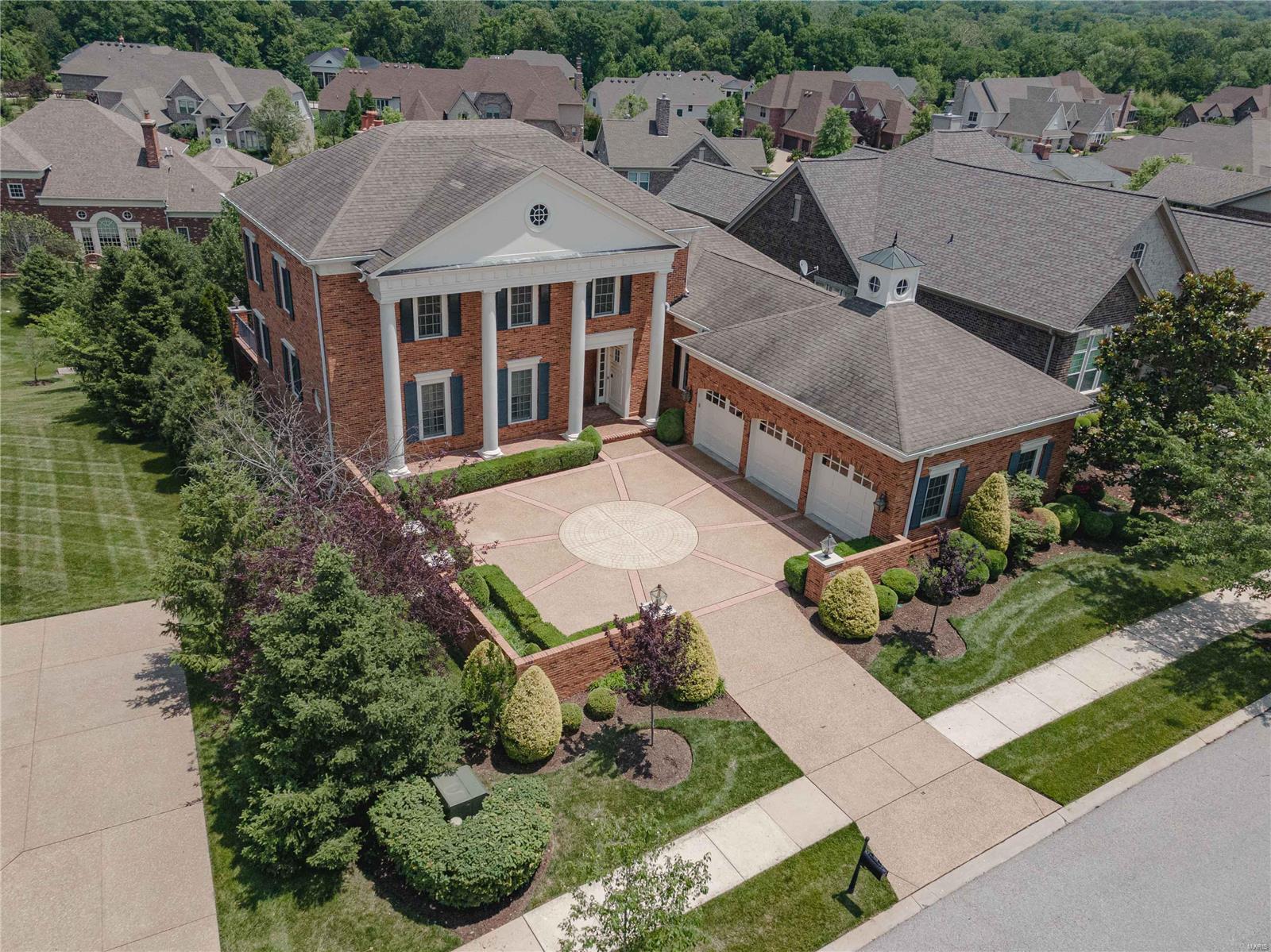 Former Enclave Bellerive Display Home has approx. 6800 finished sq. ft. ($243 psf).  This 1.5 story has countless custom features.  Sub-Zero & Wolf, Asko appliances, 4 full and 3 half baths, 3 HVAC zones and certified HBA Green.  Finished lower level includes large wet bar, a theater room, mirrored exercise room, billiards room, and 4th bedroom suite. Ceiling details include domed, barrel, coffered and vaulted, 10-14’ main floor ceilings,  Exquisite circular staircase, 3 interior (gas) and 1 exterior (wood) fireplaces (off the private concrete deck.   Extensive mature landscaping, brick courtyard with stamped concrete, wood windows, and full brick exterior.     
  For the discriminating buyer who enjoys ample space, superior quality plus the security of this premier West County gated community.  Enjoy the best in carefree single family, “villa style” living.  Yard, snow removal & irrigation water part of the $585 HOA fees. Listing Agent related to Seller.  Investor owned.
