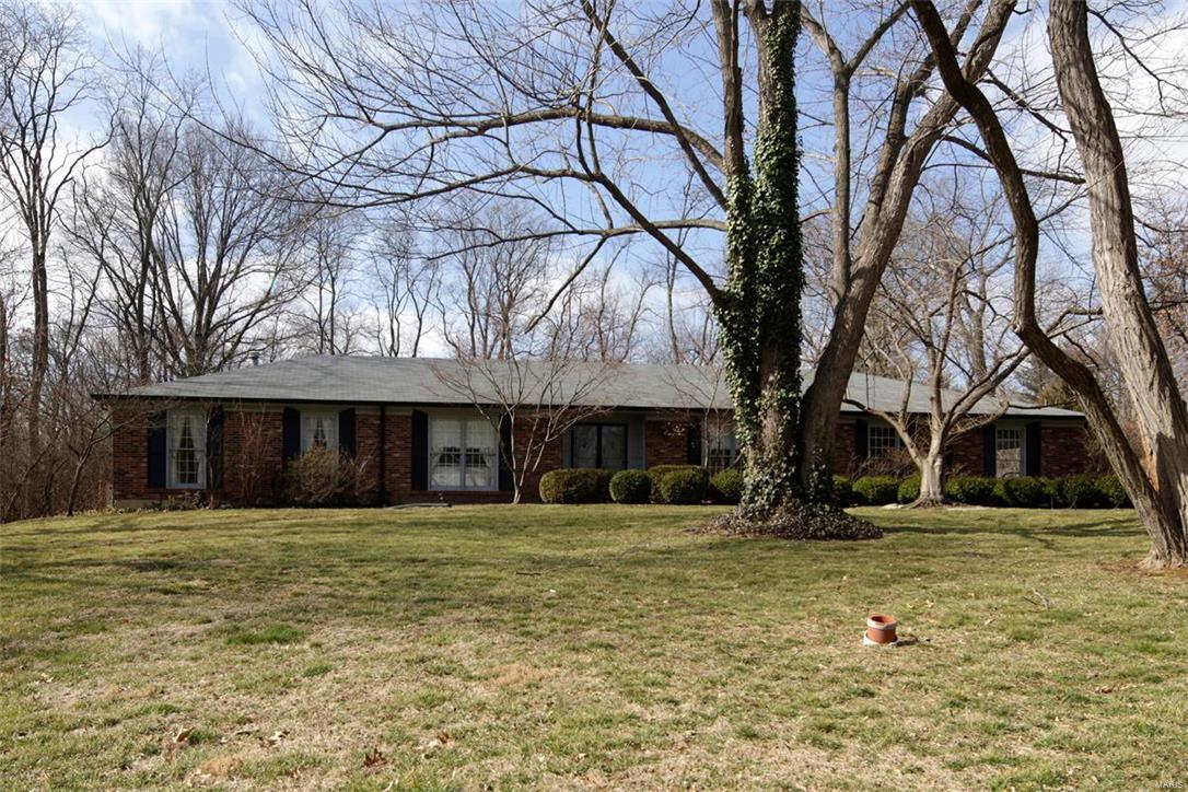 OPEN HOUSE CANCELLED!  Fabulous opportunity to build your dream home or to update this 3 Bedroom/3.5 Bath ranch on a very quiet street in Des Peres. On .84 acres this classic ranch has a light filled living room, a generous sized dining room, a large family room with fireplace and wet bar with hardwood flooring and sliding glass doors to patio and yard.  Kitchen with adjoining breakfast room has access to a cozy 17' x 7' screened porch overlooking the property.  Master bedroom suite, 2 additional bedrooms plus full bath, updated powder room and laundry complete the main level.  Partially finished lower level with 2nd fireplace, bath and lots of storage.  House being sold "as-is".  Seller to make no repairs or do any inspections.