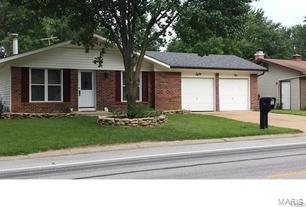 Back on the market at no fault of the sellers.  Priced well below market for this subdivision! Schedule your tour today before you miss out on this St. Peters Charmer.  Within walking distance of two parks and close to everything, this ranch will make the perfect starter home.  The freestanding wood-burning fireplace warms the space well during the winter, saving hundreds on natural gas costs.  The large eat-in kitchen is features updated cabinets, counter-tops, and flooring.  An updated, open spindled staircase completes the open feeling of the room.  Honey colored hardwood flooring throughout the home add a pleasant touch this cozy floor plan.  Recent updates include a new roof, new garage access door, newer windows with TRANSFERABLE lifetime warranty, entire house rewired in copper, fresh paint, and more! SPECIAL FINANCING AVAILABLE! Owner-Agent