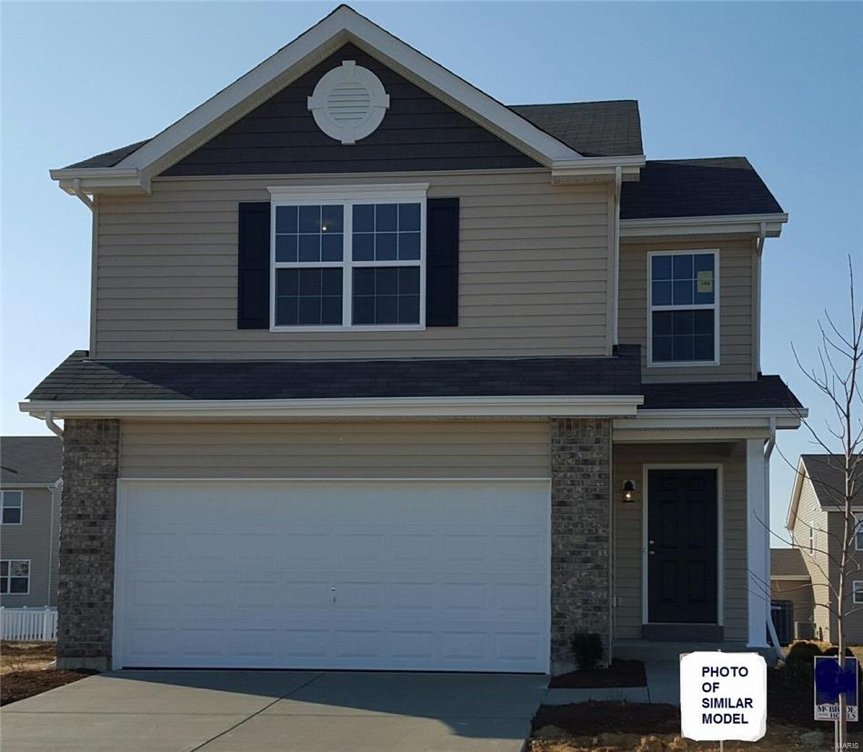 This brand new beautiful Burlington Model by McBride & Son Homes will be ready to move into October 2017. This home has the raised breakfast bar for entertaining along w/ 2nd level kitchen cabinets and stainless appliances. The master bedroom suite has TWO walk in closets, plus the luxury master bath featuring 2 sinks and separate marble tub and shower. Nice size secondary bedrooms also have walk in closets. All this on a nice Look-out lot.Lookout Homesite. Also included: 42" Tall Wall Cabinets, Master Bathroom w/ Adult Height Vanity, Upgraded Flooring, Laundry on Second Floor, Brushed Nickel Lighting Package, Six Panel Doors w/ Satin Nickel Hardware, Coach Lights at Garage, Soffit and Fascia Photos of similar model. Optional features or features may be shown. Consult with on-site sales for a list of included features. Peruque Hills is convenient to both major shopping and popular restaurants. In addition, there's wildlife to be enjoyed on the community walking trail to Peruque Creek.
