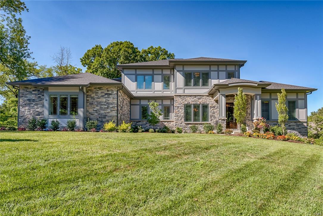 ANOTHER SPECTACULAR PROPERTY by MARK S MEHLMAN HOMES. Perfect 5BR/5.5BA, 1.5 story Prairie-style in cul-de-sac on a private Ln. Thoughtfully designed by Lauren Strutman, enjoy natural-light and beautiful views from all rooms. Entry flanked by study & formal dining. Incredible family room with 2-story vaulted ceiling & stacked stone gas FP w/floating mantel is the heart of the home. Center island eat-in gourmet kit w/breakfast bar, custom cabinets, granite, Wolf/Subzero, 5 burner cooktop, butler’s pantry w/bev cooler. Master suite has an elegant Bath w/ coffered ceilings, oversized shower & free standing tub w/huge custom closet. Upstairs are three ensuite bedrooms w/custom closets and 2nd laundry. High-end finishes include 3 car gar, custom Pella Windows, Mahogany entry door, 10’ 1st floor ceilings, zoned HVAC, irrigation system, alarm. Finished LL walk-out with 9’ ceilings, full-height windows, wet bar, fplc, 60” TV, BR and full Ba.  Ladue Schools. Fenced backyard perfect for a pool. Additional Rooms: Mud Room