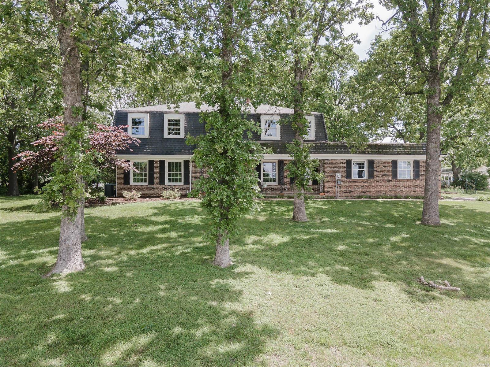 Beautiful 4 bedroom, 3 bath brick home is located on a quiet cul-de-sac. Many upgrades include new doors, windows, a whole-house HEPA system, a reverse osmosis system, and a humidifier. The main floor boasts wood floors, a large home office, a formal dining room, living room, and a hearth room. The kitchen features stainless steel appliances with an induction cooktop, wall oven, microwave, and lovely granite countertops. You'll be impressed with the special trim work and moldings! Main floor laundry hookup is available or you can leave it in the basement. Upstairs are 4 spacious bedrooms with deep, decorative window sills with views for days! There is an unfinished basement. The backyard makes spending time outdoors a breeze. You'll find a spacious patio, large kitchen garden, and a newer shed in the backyard. Lots of mature trees and a wood privacy fence. Asphalt driveway, 2 car garage, security camera alarm system and so much more.

Interior photos coming soon!