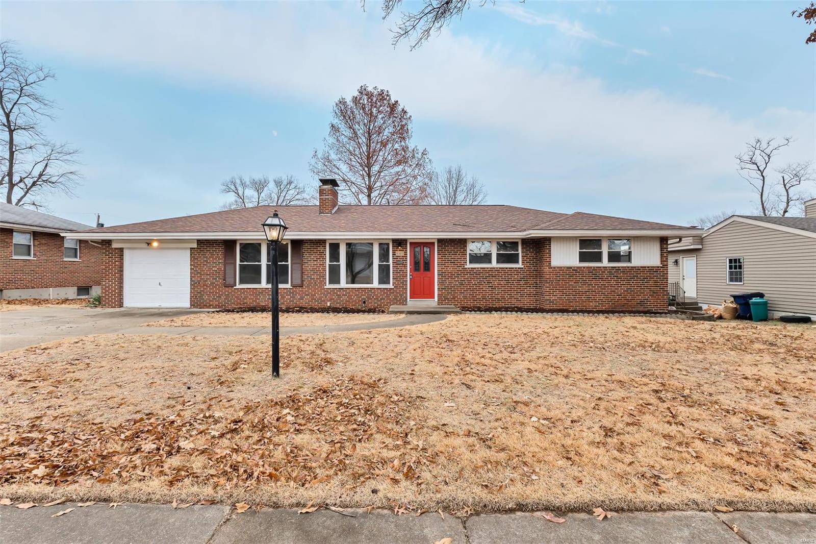 Large updated home, in hidden, private cul-de-sac.  Large ranch style home with beautiful hardwood floors throughout, refinished kitchen cabinets, and updated bathrooms.  Cuddle up in the family room by the cozy fireplace, or enjoy the large partially finished, walk out basement, great for a family room, or potential fourth bedroom, with brand new carpet, and an additional fully updated bath.  Exit your French doors to a large deck overlooking your new spacious yard.  
This home has been updated with care and just waiting for you move in and add your personal touches.