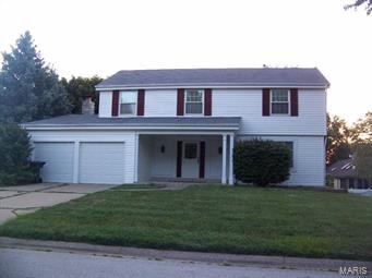 Spacious 2 story with 4 bedrooms, 2 1/2 baths with walk-out basement leading to a large yard with mature trees, and nice size deck. Inside you will find wood entry foyer, built-in bookcases flanking the wood burning fireplace, bay windows, skylights & 6 panel doors. The master bedroom is generous in size, and has not one, but two walk-in closets. Master bath has separate shower, large tub, and double vanity. Located in quiet neighborhood close to Mexico & Spencer Roads.  Security Deposit $1350, Owner may consider pet with additional deposit. Key may be checked out to view the home by presenting a photo ID at SCHNEIDER Real Estate, One Point West Blvd., St. Charles, MO 63301 (located just East of Hampton Inn at Cave Springs & I70 interchange) during office hours Monday-Friday 9AM-5PM or Saturday 11AM-2PM.