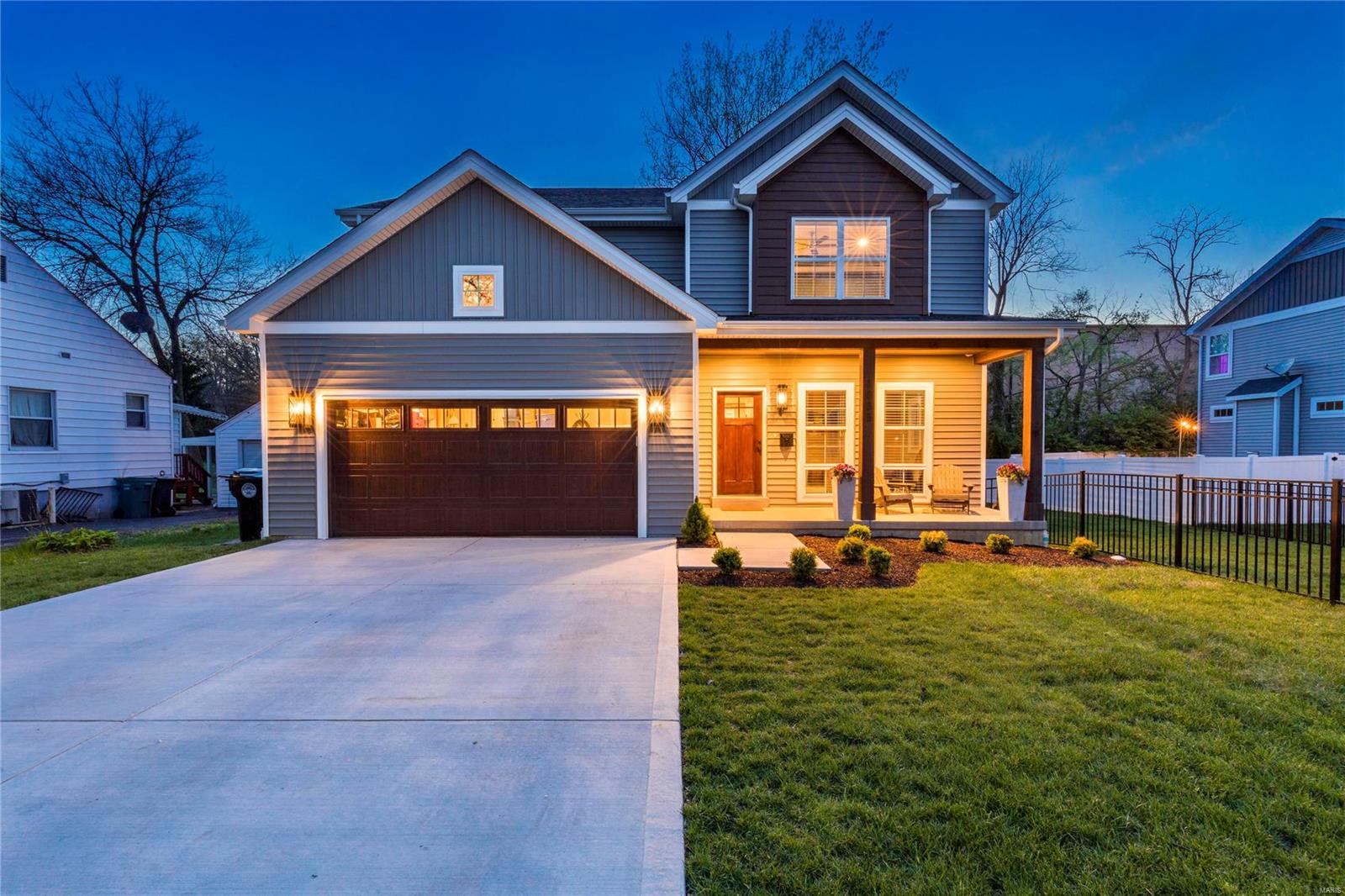 This gorgeous home in top rated KIRKWOOD SCHOOLS, that you can WALK to, was custom built for these sellers and they would take it with them if they could! Take advantage of better than new, with the fresh smell of NEW CONSTRUCTION, that includes amenities like blinds and fencing that you typically don't get with new construction. Every finish selection has been meticulously curated for you so that you can simply move in and enjoy. Welcome guests from the homey covered front porch, and instantly wow them inside with gorgeous engineered HARDWOOD, sleek window trim and moldings, TRAY CEILING in the Dining Room, upgraded lighting package, trendy hall bath and fixtures. The WALL OF WINDOWS overlooking the backyard provides a bright, open and airy feel in the main Living Area, that is just perfect for entertaining. The Kitchen is a chef's dream with a pantry that rivals a specialty foot market, STAINLESS STEEL appliances, CUSTOM CABINETRY and quartz counters. You don't want to miss this one!