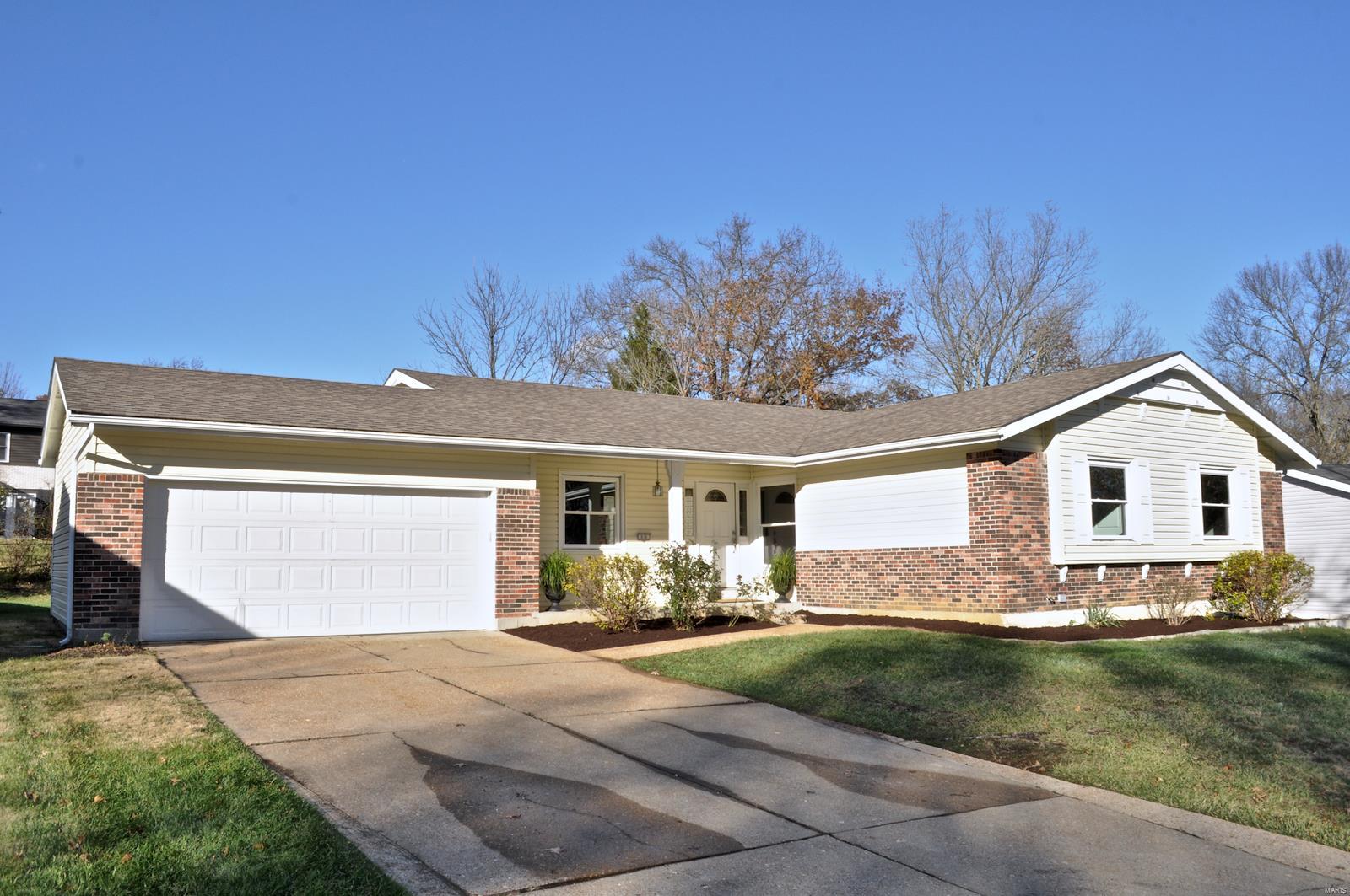 Do not miss this beautifully updated and renovated four bedroom ranch in the fabulous Woods Mill Subdivision. This lovely home has a wealth of wonderful recent updates to tout, including an eat-in kitchen with all new stainless appliances,  granite counter tops, undermount sink, and custom subway tile back-splash. The family room offers a gas-burning fireplace and sliding glass doors that open to a private patio. Additionally, you will find new thermal tilt-in windows, six-panel doors, flooring, baths, fresh paint throughout, an expansive finished lower level with separate office space and half bath, and attached two-car garage.  This one is turnkey, ready for its next owner to move in!