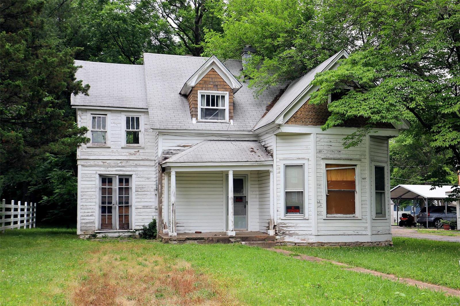 Time to bring this piece of Farmington history back to its glory days! Great potential with a lot of charm inside and out. Original mill work and stair railing, pocket door, french doors. The lot is deep with a private back yard and its walking distance to downtown Farmington! Come see the potential for yourself today!