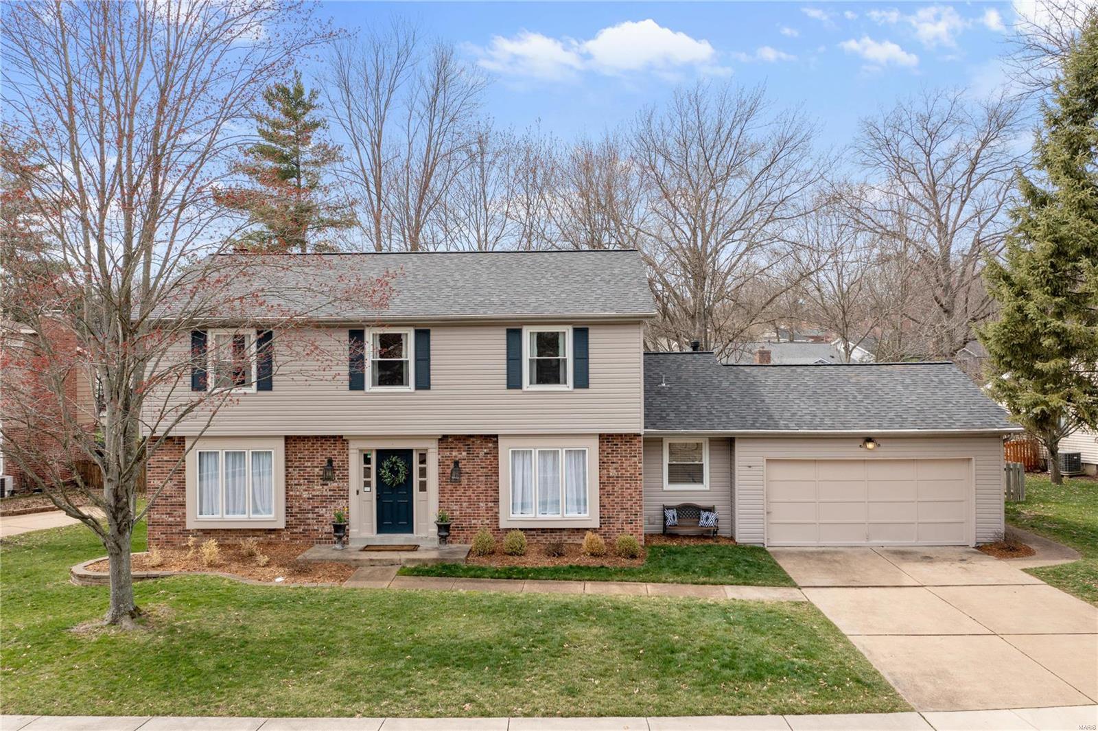 Searching for a wonderful home in the heart of Chesterfield? Look no further. This charming colonial has many updates and offers nearly 3,000 Sqft of living space! Brand new roof, recently finished lower level, newer light fixtures, carpet, HVAC & exterior siding. Generously sized rooms make the main level a great space for entertainment. The heart of which is the family room with built-in bookshelves & fireplace. The spacious eat-in kitchen includes a breakfast bar, built-in secretary and opens to the backyard. Main floor laundry and large formal living & dining round off the 1st floor. Upstairs, you'll find a lovely primary suite w/ walk-in closet & a beautifully updated ensuite. A large hall bathroom is also updated with excellent finishes. The cozy finished lower level is the perfect space to sit back and relax. With Spring right around the corner, the fully fenced backyard and patio will make those warmer days so enjoyable! 2-car garage and Parkway West Schools. A must see!
