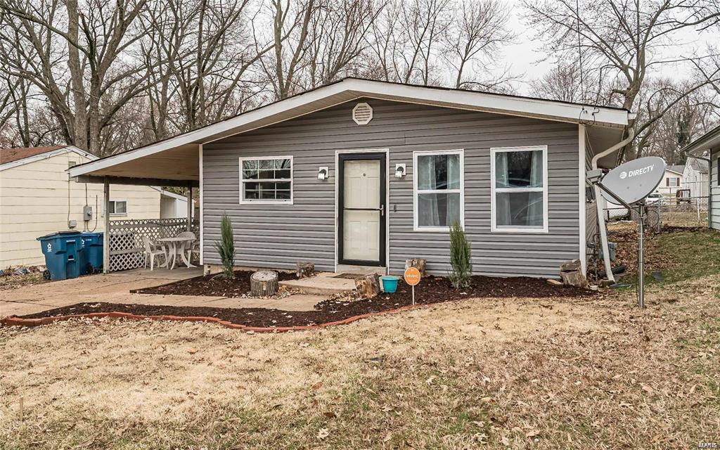Welcome to this move in ready Charming BUNGALOW! This Gorgeous home features a Large living room that opens to a stunning dining room. The kitchen is nicely updated customized with a center island, updated cabinets, fully functional dishwasher and more. The Bathroom has been updated with a stunning custom vanity and newer flooring. Step Outside to a large entertaining space where you will find a nice covered deck with a level backyard. This home is MOVE IN READY! Come check it out now!