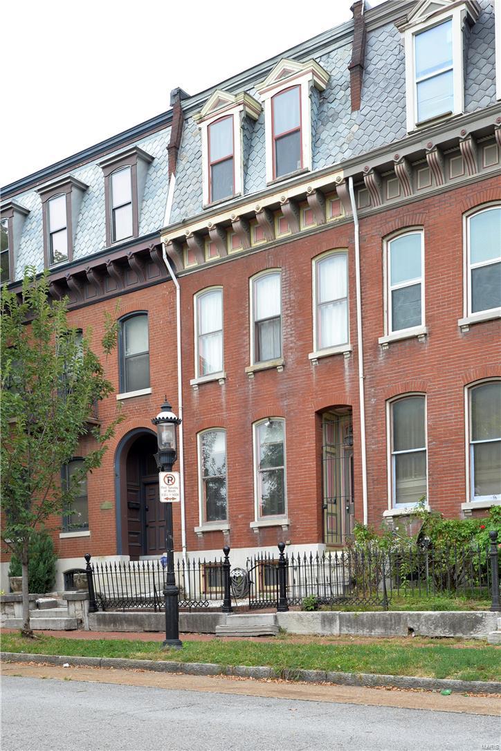 Beautiful 3 story Victorian Townhouse minutes from Lafayette, Soulard & Downtown.  First floor has a living & dining room with pocket doors to close for a private dinner or open for entertaining. Living room has a working fireplace.  The large eat-in kitchen has great cabinet and counter space.  Second floor has the original master bedroom complete with a fireplace and a private bath with access to a bonus room that has built in bookcases and can be used as an office, playroom or reading room.  There is also an additional bedroom & full bath.  Third floor is the master room suite with a large bedroom, full bath and bonus room that can be used as a fantastic closet, office or nursery.  The 3 story staircase has a skylight at the top allowing in tons of natural light.  The backyard provides a brick patio private space. Special features include lrg windows, hardwood floors throughout, 11' foot ceilings.  There are 3 zones of HVAC.  Seller to offer $5000 closing credit if close before 5/31