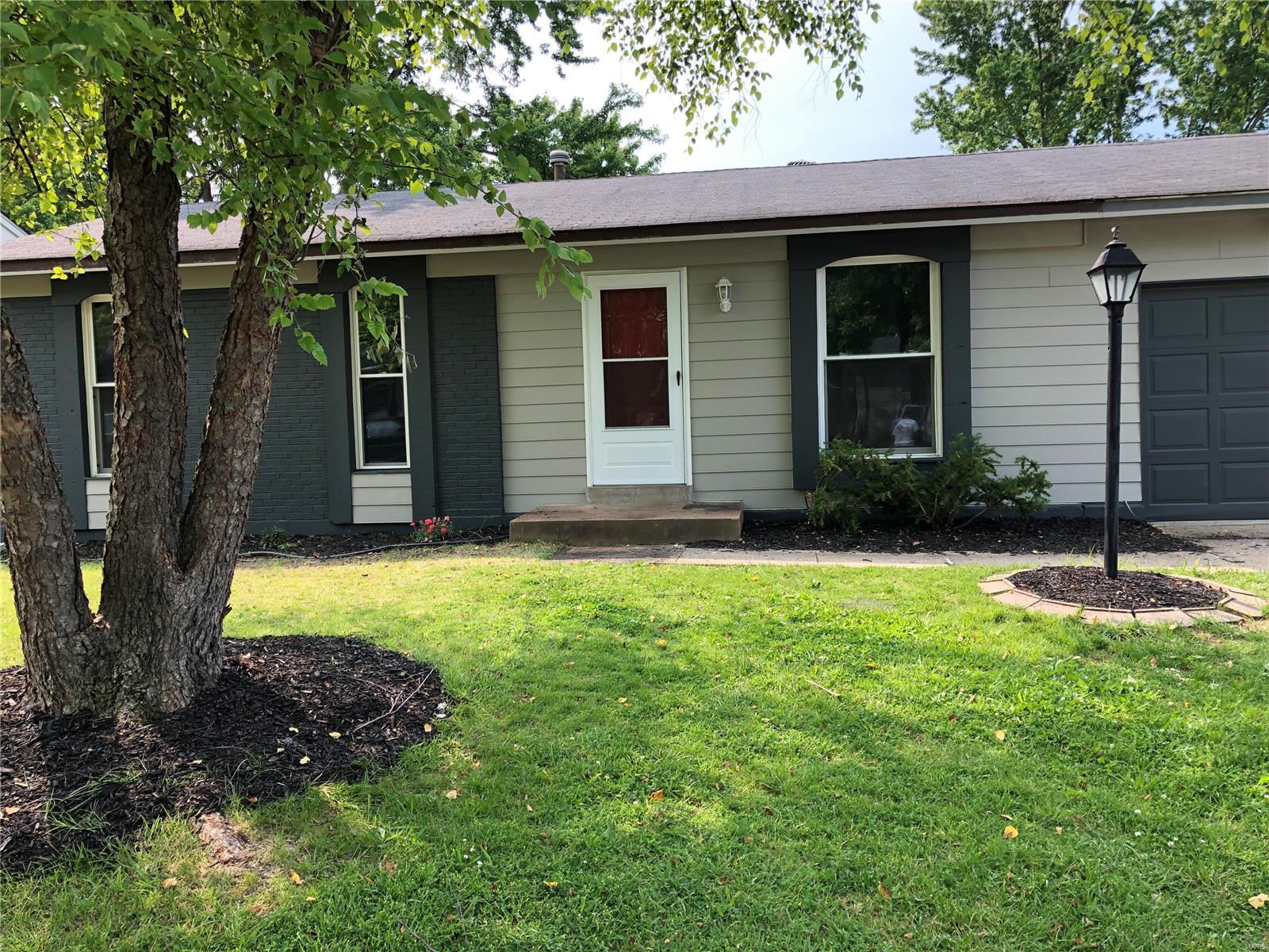 Freshly painted and new carpet throughout.  New siding on the front of house/paint to the exterior.  Electrical and plumping updated, new electric panel. Nothing to do but just move in!! Finished lower level with fireplace wet bar and 4th bedroom with a walkout to the fenced level back yard,