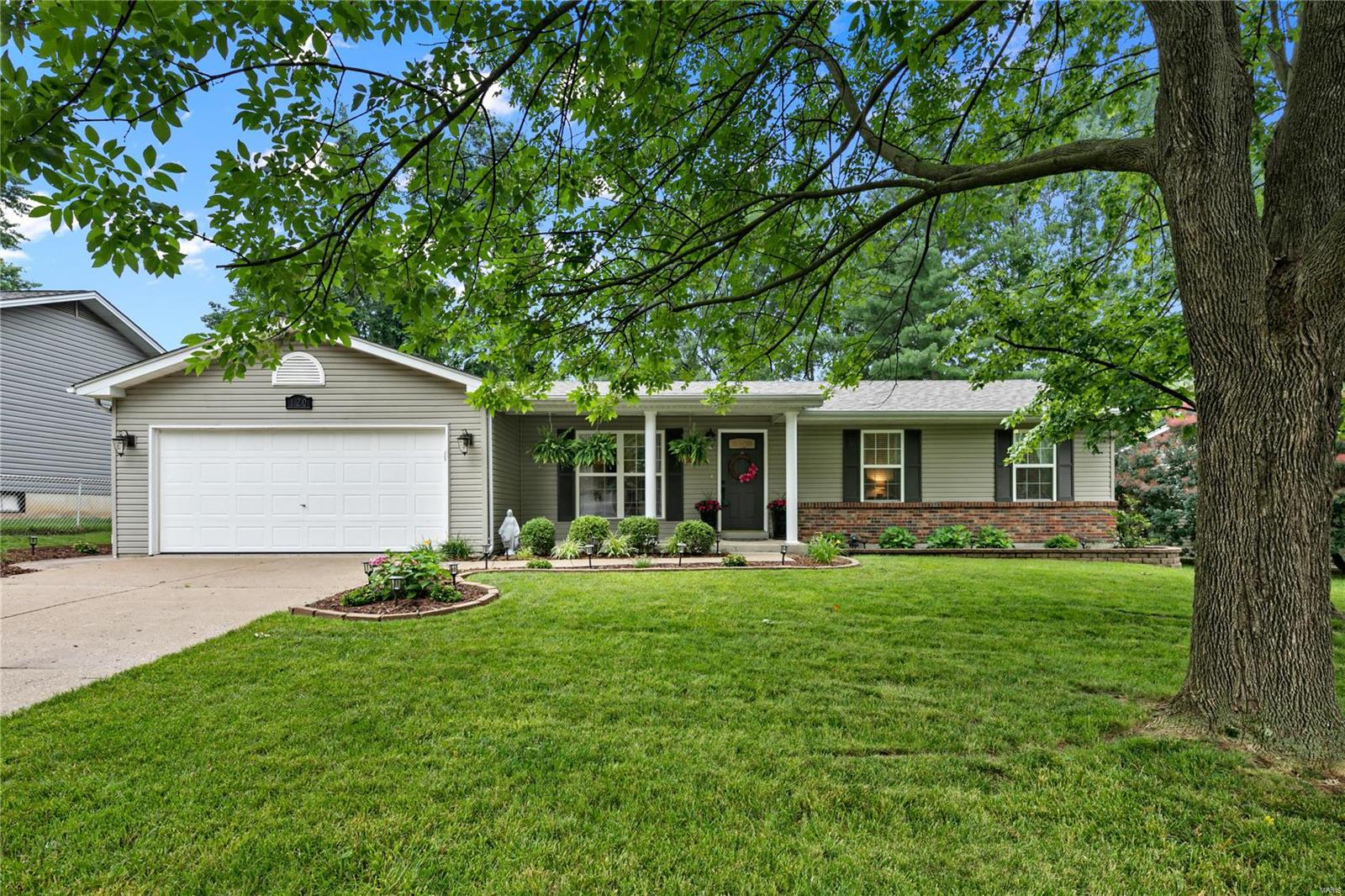 Adorable home inside & out.  As you pull up you will notice the newer architectural roof, maintenance free vinyl siding, enclosed soffits, landscaping w/stone edging, solar lighting & a watering system.  Now step inside to a formal Living Rm. From there the home opens to the Kitchen & Family Rm.  Making this a perfect space for family & friends to gather.  The spacious Kitchen has some newer appliances, a center island, plenty of cabinets & countertops & an eat-in Breakfast Rm overlooking the Family Rm & backyard. The Family Rm is vaulted w/woodburning fireplace w/a gas line ready to be converted to gas logs.  A newer sliding glass door takes you out to a stamped patio, a level fenced in backyard that is nicely landscaped & offers a vegetable garden w/water system. Back inside the Master Bdrm has a spacious closet w/custom organizers, a full Bath w/adult height vanity & shower.  There is a subdivision pool, tennis court, stocked lake, walking trail & close to restaurants & shopping