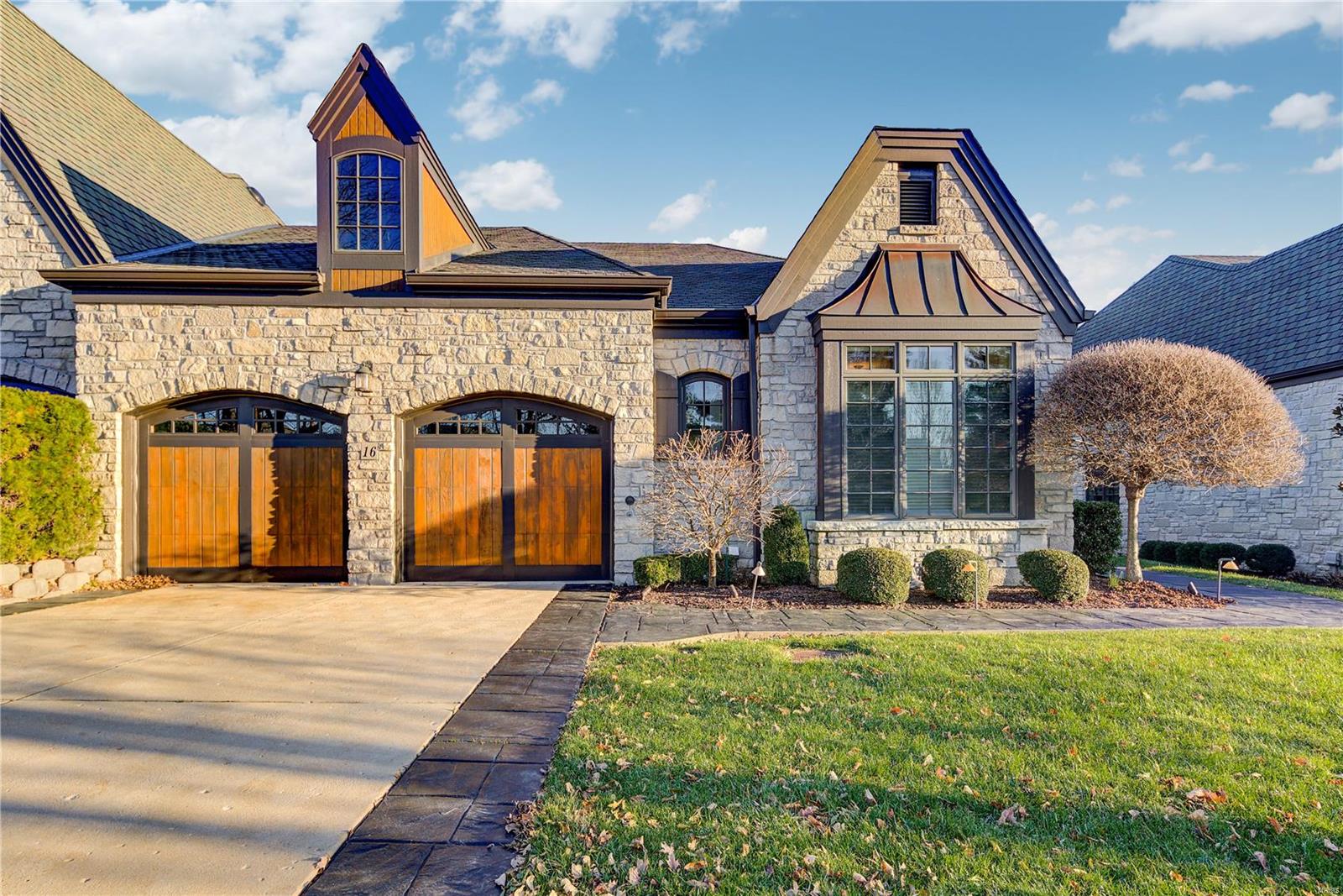ATTENTION BUYERS: Exceptional newer ranch villa with desired floor plan that most discriminate buyers ready to make the move to a villa are looking for: TWO BEDROOMS + OFFICE + TWO & ONE HALF BATHS ON THE FIRST FLOOR + FINISHED LOWER LEVEL WITH THIRD BEDROOM, FULL BATH & REC ROOM. Luxurious master suite features an immense custom closet & massive master bath with amenities galore. Second bedroom is well located with privacy for guests, grandchildren, visiting family.  First floor office has beautiful wood finishes. The 2700+ square feet on the first floor features an open floor plan with wonderful great room with fireplace, formal dining room, amenity loaded kitchen & beautiful cabinets. Breakfast room leads to private deck. Walkout lower level has fireplace & screened porch. Prestigious 24 gated Conway on the Grove in Chesterfield has beautiful architecture & quality exterior finishes!  Close to shopping and restaurants. This villa is ideally situated in this upscale neighborhood. Location: End Unit