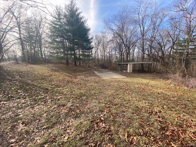**Multiple offers received, Highest and Best due Sunday 1/10/21 at 6pm.  Great opportunity here, 1.7 acre lot.   This property previously had a mobile home on it that had public water, electric, and septic system.  Electric and septic are at property.  Driveway leads to 78x12 concrete pad.  Not many homes located on this private block. 
 Located in sought after area near main roads and major highway access.  Property to be sold in as is - where is condition. Don't wait on this one, call today!