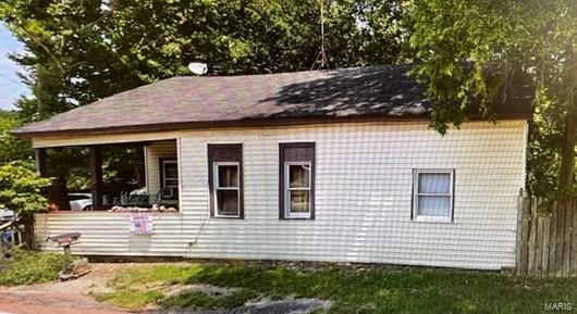 This home requires a lot of TLC.  There are two lots with the property.  The setting is beautiful and boarders the Pevely Farm golf course.

Property to be sold 'as is'.  All measurements and square footage are approximate.

Seller is a licensed Missouri real estate agent.