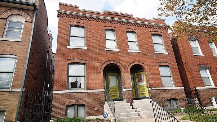 Entered for comparable purposes. Stunning three family built in 1908 and fully restored in 2008. Building features a two story 1340 sq. ft. town house which has two bedrooms with a study, one and a half baths with a two story deck. There are also two 1 bedroom apartments on the first and second floor. Features include central air, hardwood floors, in unit washer/dryer, updated kitchens with granite counter-tops and stainless steel appliances, key card entry systems, large bedroom closets. The electric, PVC plumbing, HVAC were updated when restored. This property would be ideal for an owner occupant. Located one block from Forest Park, walking distance to Barnes-Jewish Hospital, the restaurants and nightlife on Manchester. Townhouse unit is vacant but was rented for $1500 a month. The one bedroom units were each rented for $950 a month.