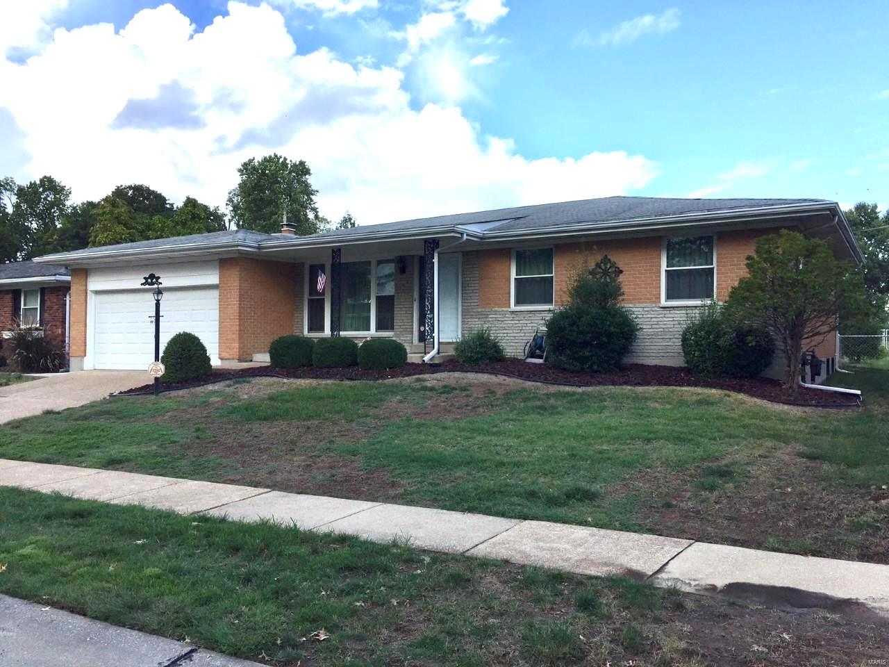 Mostly brick seven-room ranch with 3 bedrooms and 2 full baths! Newer furnace and HVAC. Oversized 2 car garage and great fenced yard backing to a parklike setting and with a brick BBQ pit. Woodburning fireplace in the family room. Newer vinyl windows, gas oven and cooktop. Kitchen with refrigerator included. Has home security system and a home protection plan will be provided by the seller. The basement includes washer dryer hookups and a workshop. Walk out to the back yard.