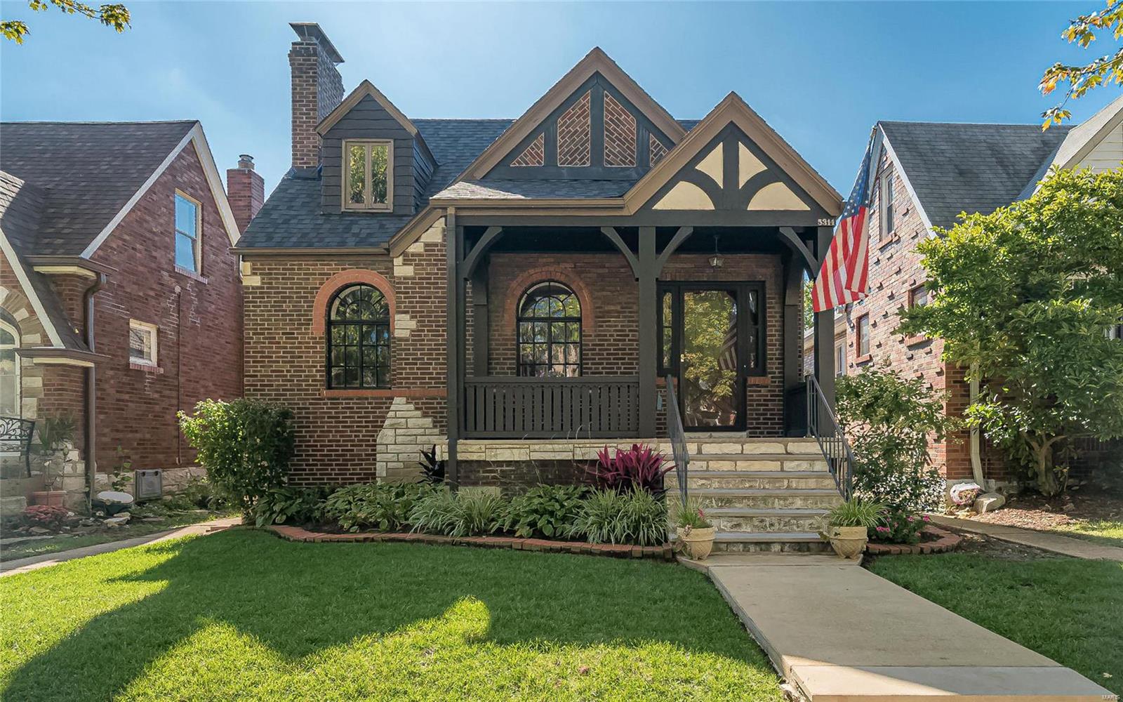 This 2000 SF Northampton 1.5 story 3 bedrm brick home is in a neighborhood loaded with restaurants less than 15 min walking distance along with activities at Tilles park 7 blocks away. Besides unique neighboring homes, a tree-lined street, easy access to highways and shopping, this pretty English-style home features a covered porch with limestone steps, tinted leaded-glass arch windows, hardwood floor, original doors, glass knobs, & bath tile.  Way more room than most houses of this era where the kitchen can easily play host to your guests and spill out onto the deck with pergola.  Remodeled kitchen w/maple cabs, butler’s pantry along with a center-island eating area for quick bites.  2 bedrooms and full bath on 1st floor with a HUGE 2nd floor open area accented by eaves and angles with generous ceiling height.  Basement is unfinished but with those rare glazed-brick walls will look pretty spectacular once you paint the floor and rafters!  2 car garage, fenced yard.  GET HERE QUICKLY!!
