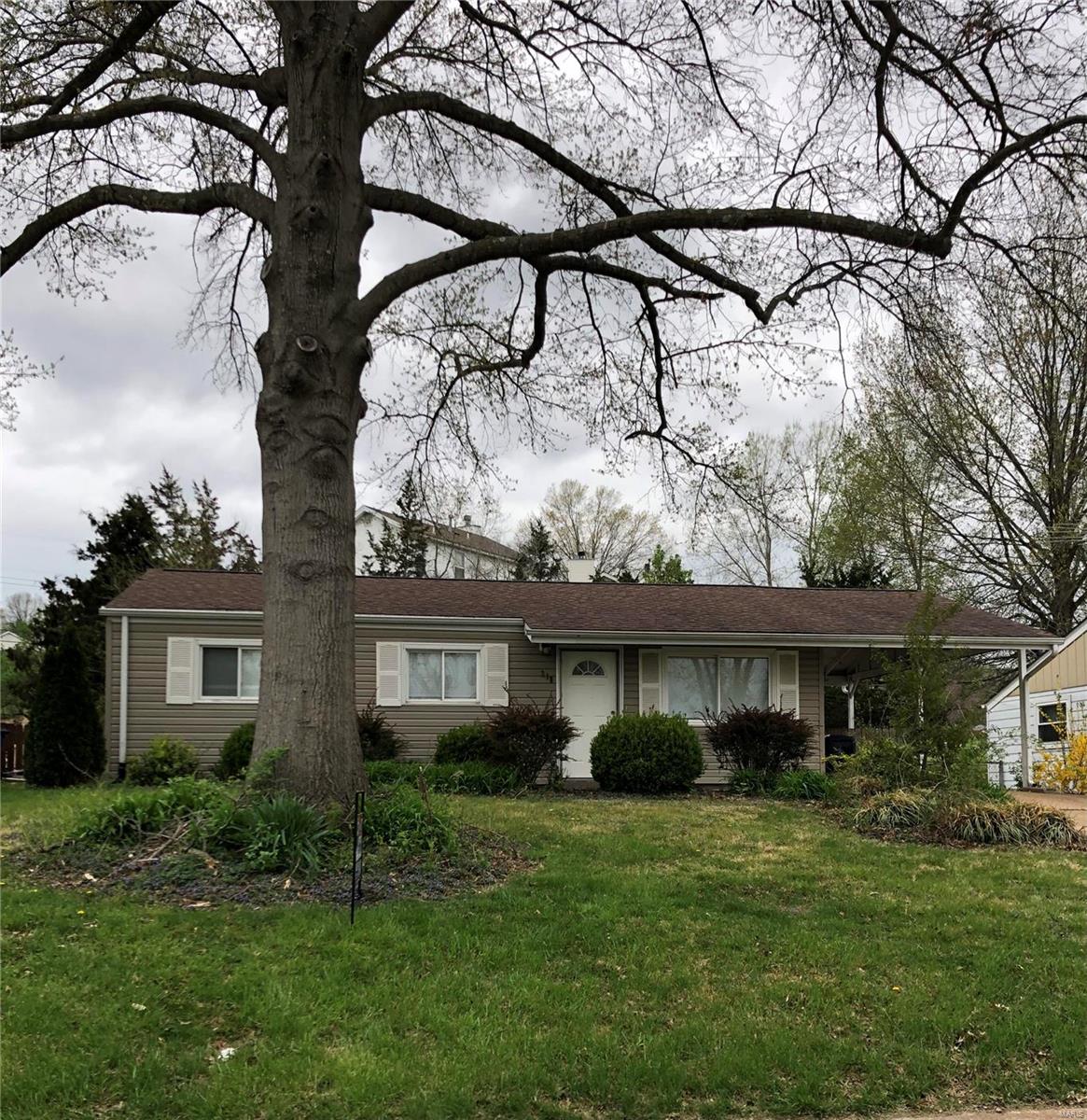 Very Cute style ranch home with 3 bedrooms and 1 full bath.  Large fenced yard.  1 car carport.  This home is being sold in "AS IS " condition.  Kitchen appliances have been replaced within one year, all flooring within one year. Please do not open the back door.