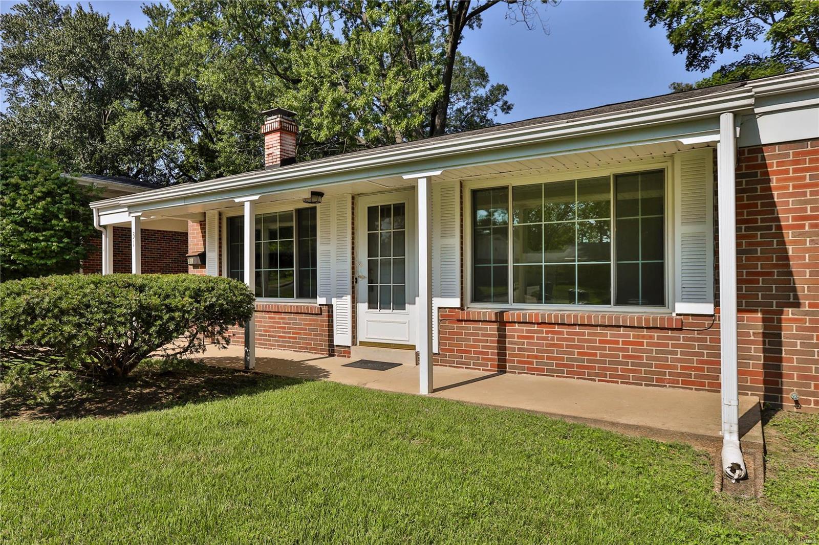 Come discover this well cared for and comfortable home on this quiet street.  There are three nice sized bedrooms, including a full   
 en-suite primary bedroom with double closet.  Hall bath in spa-like colors services the two additional bedrooms and your guests.  Seller believes there are wood floors beneath the carpet.  The kitchen was well thought out and designed with custom cabinets when updated.  Living room has wood burning fireplace ("as is"), vaulted ceiling and is open to dining room.  Lower level is partially finished and includes great storage.  (Seller has never used the fireplace in the lower level and does not warrant its condition.)  Washer and dryer to stay with property, as do all other appliances, all in "as is" condition. Large fenced backyard.  Carport.