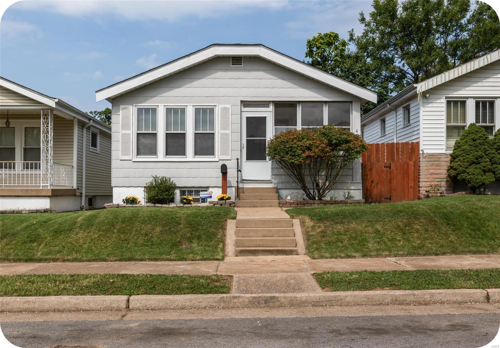 On a budget, but need space, a finished basement, 2 bathrooms, a fenced yard & a garage??? I feel ya.  It's tough out there. No worries! Here is your chance! This darling home has lots to offer: a front porch, a rear sun porch, and a finished basement w/bonus room & 1/2 bath! Lots of original charm in this cutie: original trim, wood work, wood floors & stained glass windows! Kitchen is spacious. Large enough for eat-in kitchen, nice counter space to prep & cabinets for storage. Lower level is perfect for lounging. Bonus room is ideal for a COVID office or guest room. All appliances stay- including washer & dryer. Outside: a flat fenced yard, a patio, room for a fire pit and/or a garden.  LARGE 1+ garage is ideal for the tinkerers out there too. Current owners LOVED this home, but simply outgrew it.  Come see why it would be perfect for you too. Roof (2011), washing machine (2019), Dryer (2020), HVAC & Water heater (2019), garage door (2020). Additional Rooms: Sun Room