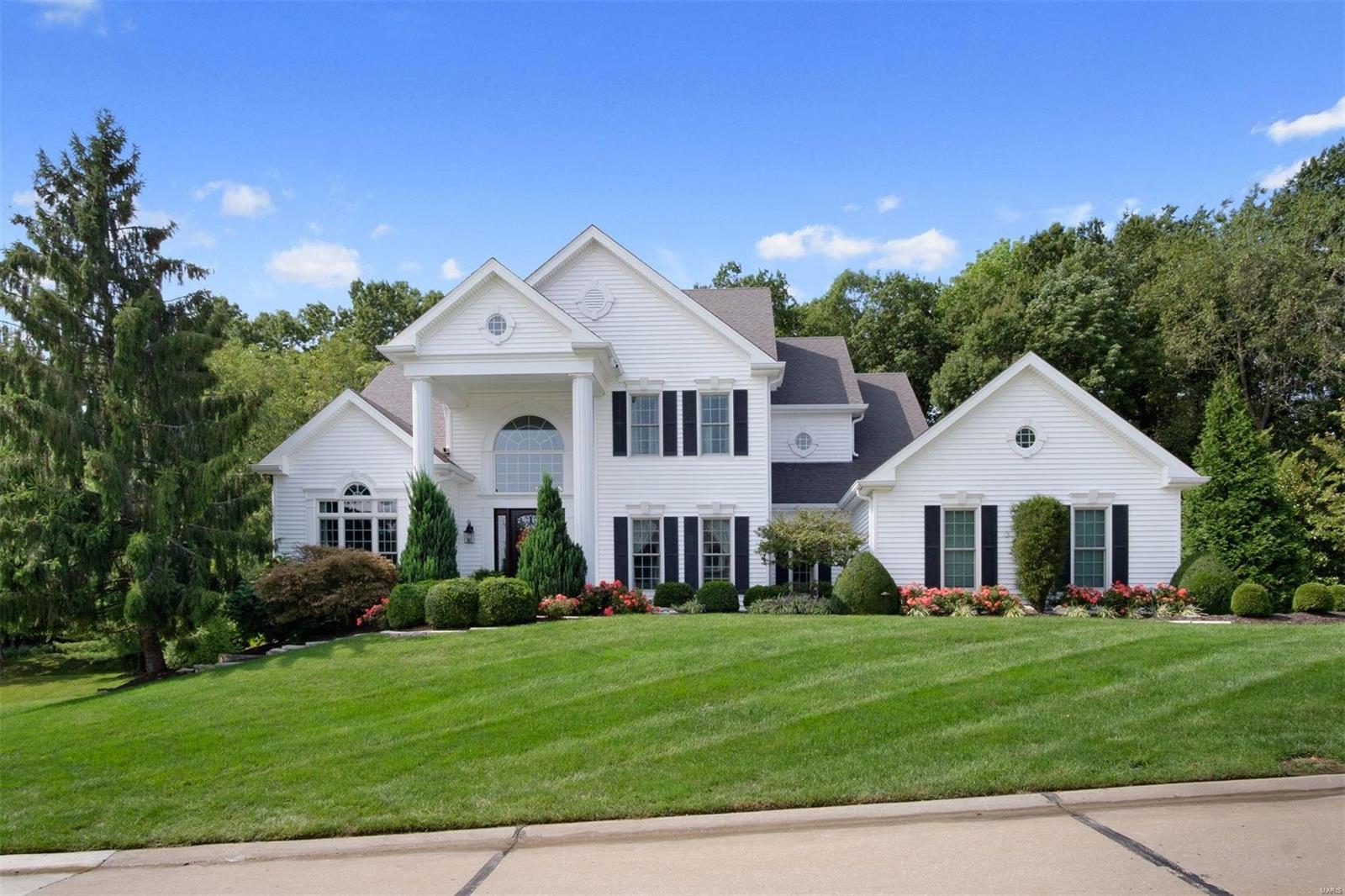 This is the home in Pine Creek that you've been waiting for! Situated on well over an acre, this 4 BR, 4 1/2 BTH boasts almost 6,000 sqft in total living area! Miceli built, this home has been completely updated from top to bottom. Hardwood floors throughout, 2-story great room and staircase, & beautiful floor to ceiling windows. Spacious & open eat-in kitchen with hearth room, separate formal dining room, and home office. Main floor master suite with a huge custom walk-in closet. The gorgeous, fully renovated master bathroom includes his & her vanities, large soaking tub, oversized walk-in shower-it's a real spa in your very own home! With almost 2,000 sqft of fully finished basement space, there is something for everyone in the family to enjoy. Billiards room, rec room, a temperature controlled wine cellar that holds up to 850 bottles. A heated pool w/ waterfall feature, beautiful landscaping, BBQ area - perfect for entertaining! Featured in St. Louis Homes & Lifestyles Magazine. Additional Rooms: Wine Cellar
