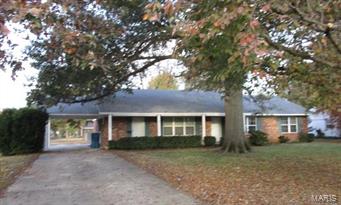 Across from city parks, walking distance to schools and other amenities. Easy access to main highways. 
2009 - some new windows
2013 - updated breaker box
2014 - updated duct work
2015 - hardwood and vinyl floor coverings

Carport drive through from front street to alley way. Backyard enclosed by chain link fence and has an outbuilding.