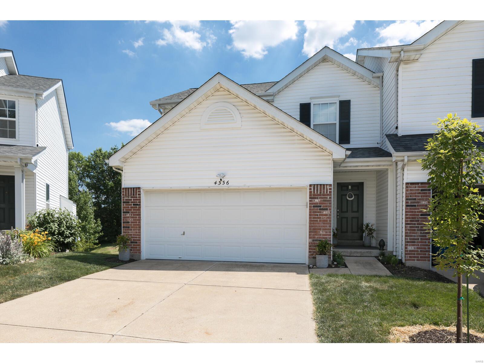 AWESOME  2 story, 2-bed, 2.5 bath villa w/2-car garage on premium lot that's "move-in" ready. Welcome Home to this impressive 2-story w/covered porch & private entryway. Over 1,700 living space to enjoy. Gorgeous wood floors greet you as you enter through the front door into the spacious foyer that moves comfortably into a large living room w/plenty of space to relax. Opens naturally into the kitchen/dining area w/custom cabinetry, decorative back splash, solid surface counters & wood floors. Walk-out from kitchen onto private deck overlooking gorgeous, spacious private common ground. 2-large bedrooms on 2nd level. Master suite w/full bath and shower plus large walk-in closet. 2nd bedroom  is good-sized w/walk-in closet. Full bath in hallway plus laundry room on 2nd level. Partially finished lower level w/family room and additional den/office space plus separate closet/storage in lower level. Finished garage w/plenty of room for 2 cars plus storage . Motivated!
