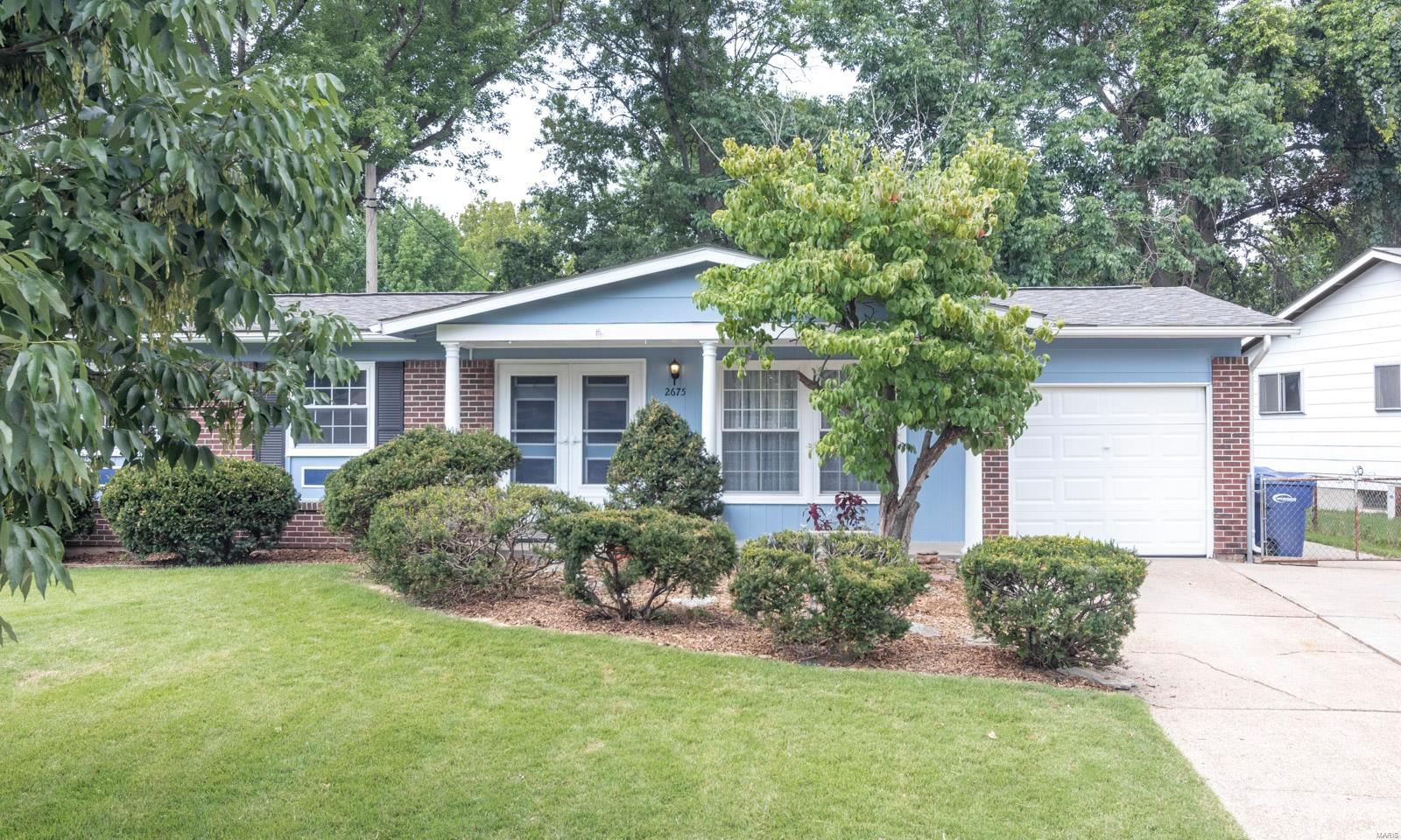 Looking for a great opportunity to put your personal touches on a home? This is the one! This 3 bedroom, 2 full bath home located in Florissant, has been lovingly cared for by one family since 1966. You are greeted by a nicely landscaped yard and your attached one car garage. You'll find a front porch perfect for lounging and getting to know your neighbors. The entrance features a foyer hallway, with formal living room with hardwood floors off to your right as you enter. The Dining Room features peg and plank flooring, and flows nicely into the kitchen, with double wall oven and gas cooktop. The Master Suite has a private bath with a shower. Two additional bedrooms and a full hall bath completes the main floor. The basement is a blank canvas waiting for you to make it perfect for you. The backyard is nice sized with a great patio space for relaxing and escaping from your daily world.