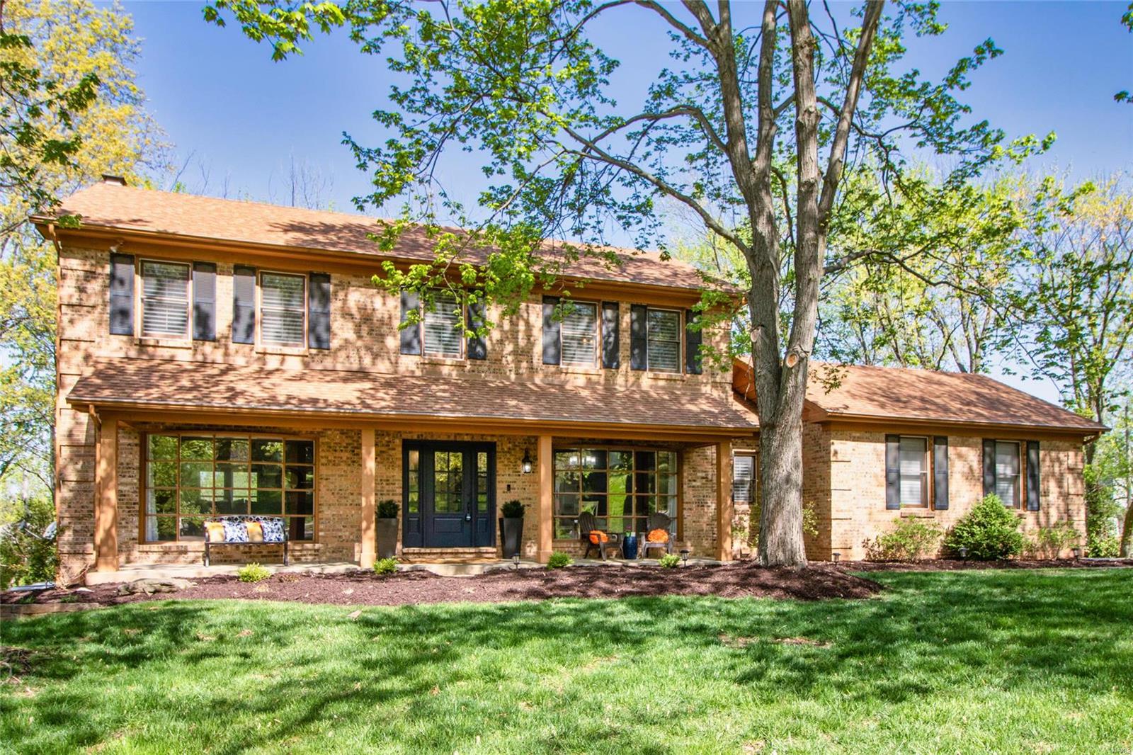 **OPEN HOUSE 4/22** You'll fall in love with this freshly updated, 5 bedroom, 3 ½ bath home in sought after Parkway Schools. Upon entry, incredible open flow with new hardwood floors, stairs, wrought iron balustrade with gas fireplace & large dining room. The new kitchen is spectacular! 42” shaker style cabinets, custom island with quartz counters, 6-burner gas range, vented hood, slide out shelving & tile flooring. Utility room off the kitchen includes built-in cabinets, washer/dryer & utility sink. Master suite is large with his/her closets, updated bath with separate tub/shower. 3 additional bedrooms with updated hall bath. Walk-out lower level is incredible! Custom stained concrete flooring in rec. room, family room, 5th bedroom & full bathroom. Relax outside on your covered patio, large deck or screened-in deck to enjoy the private yard backing to trees. Location is prime with shopping, grocery, dining, park, walking paths & easy access to 64/40 & 141! Don't delay!