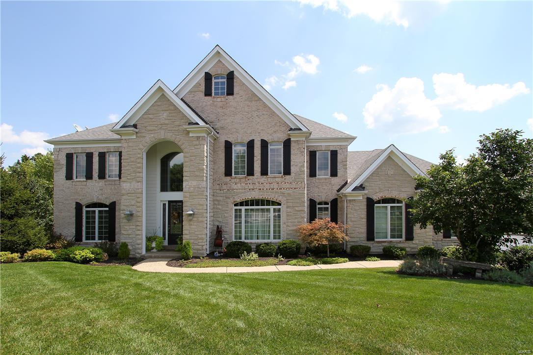 Gorgeous inside & out, this home will exceed your expectations. Relax in the backyard retreat with its panoramic views, lovely waterfalls & in-ground salt-water concrete pool. The 2 story foyer has wood floors & elegant millwork. An office is separated by tall French doors & has elegant millwork. The formal dining room has a beautiful chandelier & décor. An inviting family room features a large bay window, built-in shelves & a lovely wet bar. The expansive kitchen is the perfect gathering place with a center island, large breakfast bar, granite counters, beautiful cabinets & stainless appliances. It opens to a wonderful breakfast room & hearth room with a vaulted ceiling & brick fireplace. The master retreat features a vaulted ceiling, twin closets & a deluxe master bath. The upper level is also served by 3 lrg add’tl bedrooms with a private bath & jack n jill bath. Enjoy entertaining in the lower level with a huge rec rm, media rm, exercise rm & full bath. Don’t miss the 3-D tour!
