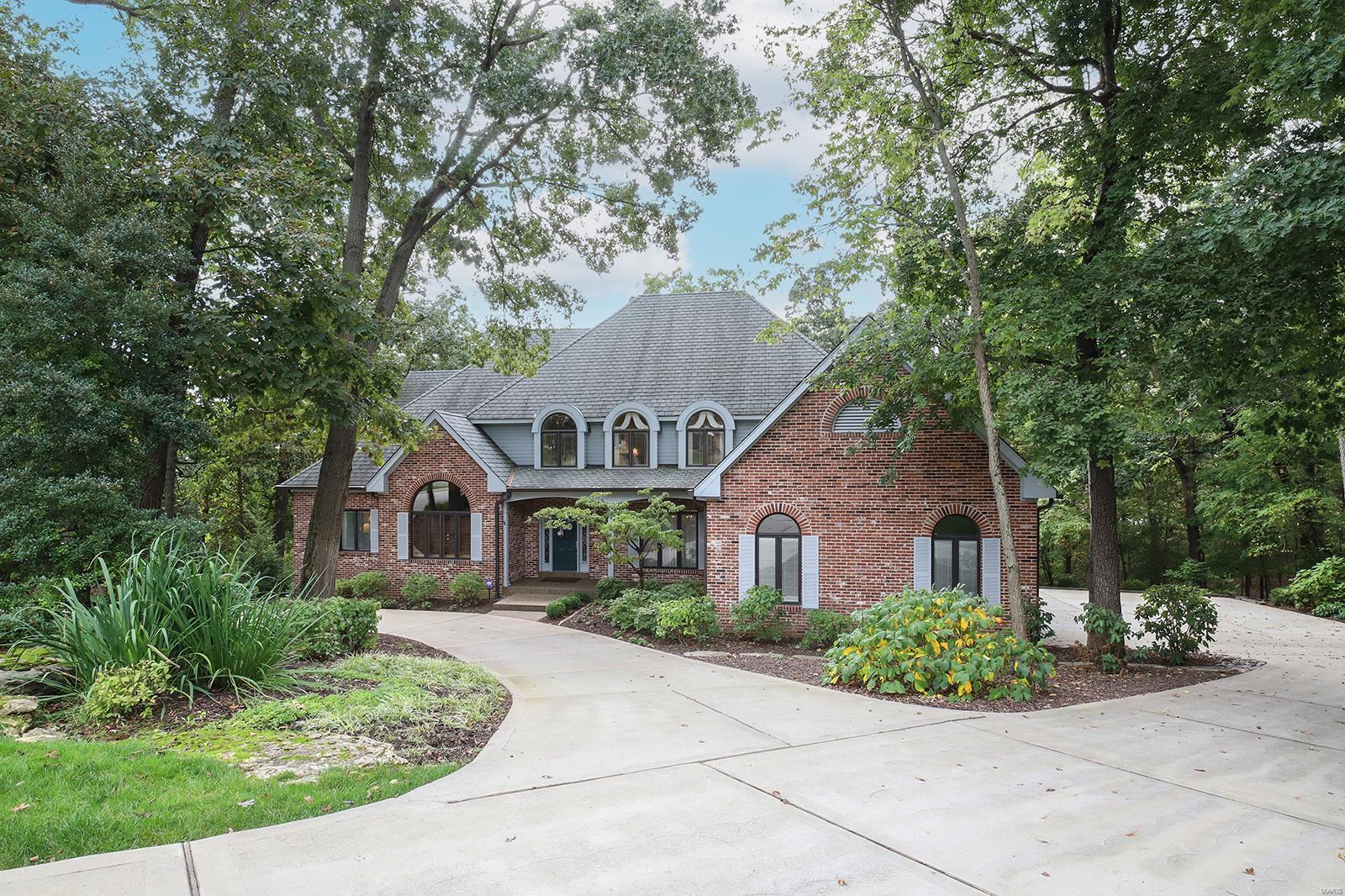 Stunning 1.5-Story, custom built home situated on a beautiful 1.48-acre wooded lot, backing to woods in the desirable Eagle Glen Estates. This 4 Bedroom, 5 Bath (3 full / 2 half) showplace with 4,533 square feet of living space, has been meticulously maintained, and is painted in stylish, neutral colors, making this home truly move-in ready. You will be wowed from the moment you walk through the front door, into the 2-Story Entry Foyer, and you will know you are home. Other features include a newer zoned HVAC (2022), 2 – 200 amp electrical panels, tankless water heater, alarm and irrigation systems, newer concrete circular drive, walkways and patio (2018), an oversized attached 3-car garage with epoxy floors, 12 foot ceiling for a lift, and 8 foot doors (2018) - just to name a few. Relax outside in your private sanctuary on the expansive low-maintenance, Palope wood deck. This home is perfect for entertaining family and friends. Location could not be better! Additional Rooms: Sun Room