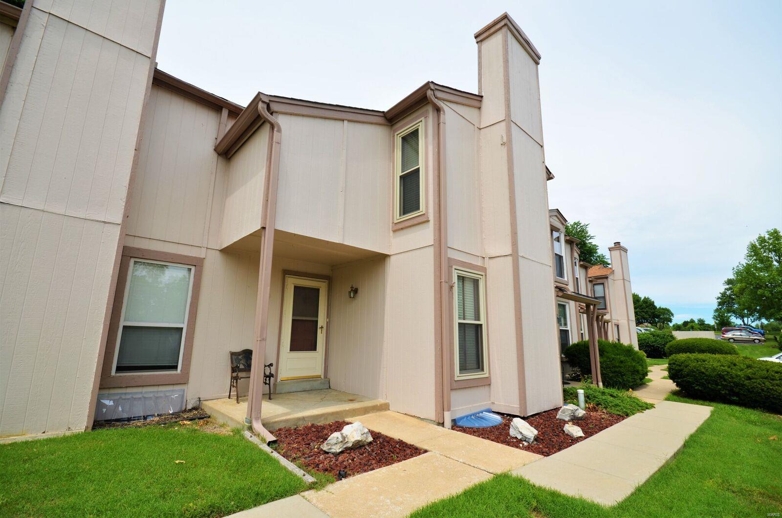 Your Opportunity to own a 3 Bedroom Townhouse in Beautiful Lake St. Louis with Full Lake Amenities & Harbor Town Amenities with Marina, Swimming Pool, Boardwalk & Beach. Open floor plan offering a family room with wood burning fireplace, a large dining room open to family room and kitchen, and 3 bedrooms, including a vaulted master bedroom with a walk-in closet.  Kitchen has a smooth top stove, built-in microwave, a refrigerator and a large window over the sink overlooking the private patio area and backyard. The atrium doors in the dining room lead to the patio and backyard area, and there's a storage locker off the patio. New furnace, AC & Water Heater 2012. Partially Finished Lower Level. Bring your boat & paddle boards, family & friends to your lake home and enjoy all of the amenities of Lake St. Louis & Harbor Town. Home to be sold as-is, seller to make no repairs. Seller will provide a LSL occupancy permit. This townhouse just needs a little updating, but it is move-in ready. Location: Ground Level