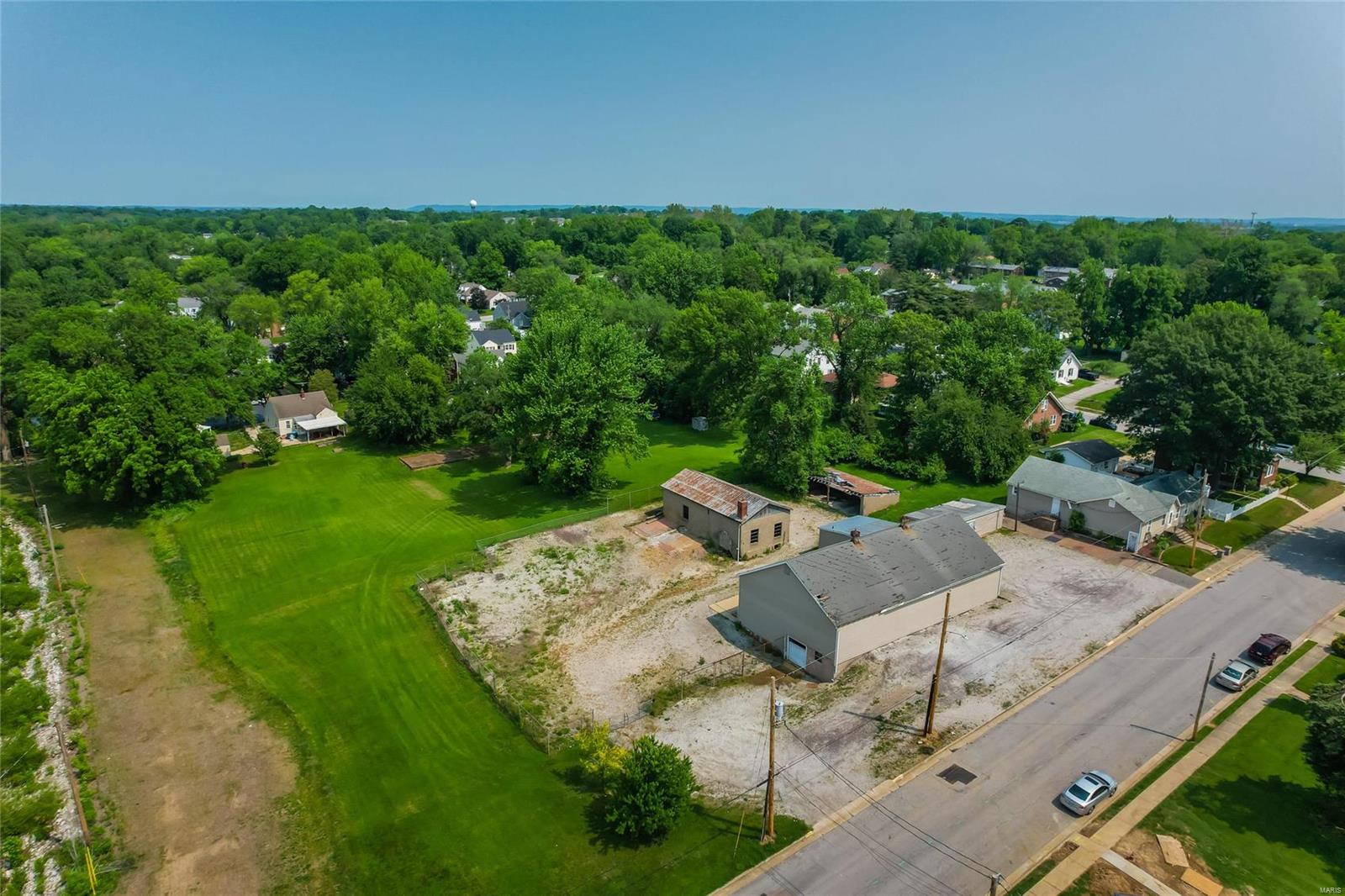 Residential Inventory shortage continues for single family home. HERE IS A Prime location to develop a multi single family home subdivision to meet that demand OR build your dream home on an incredible lot. Residential development opportunity in the heart of St. Charles! Approximately 2 acres parcel zoned R-1E.  Property was previously a business under special use variance (no longer available).  With approval from City of St. Charles Planning & Zoning the following permitted uses are options: Single Family Homes (no mobile homes), Group Living Arrangements (Care Home for Mentally Handicap children, Foster Care, Mentally or physically handicapped, Residential Care Facility). Please feel free to contact Planning & Zoning directly with any questions.  Property being sold as is.