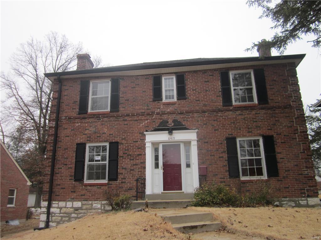Do not miss out on this spacious 2 story brick home. Inside you will find 3 bedrooms, 1.5 bathrooms, custom kitchen with ceramic floors, living room with fireplace, separate dining room as well as an additional great room with vaulted ceilings. Home has many appealing features such as stained glass, some hardwood flooring, and crown molding. There is a full and unfinished walk out basement, and a deck off the back of the home leading to a level and fenced lot.