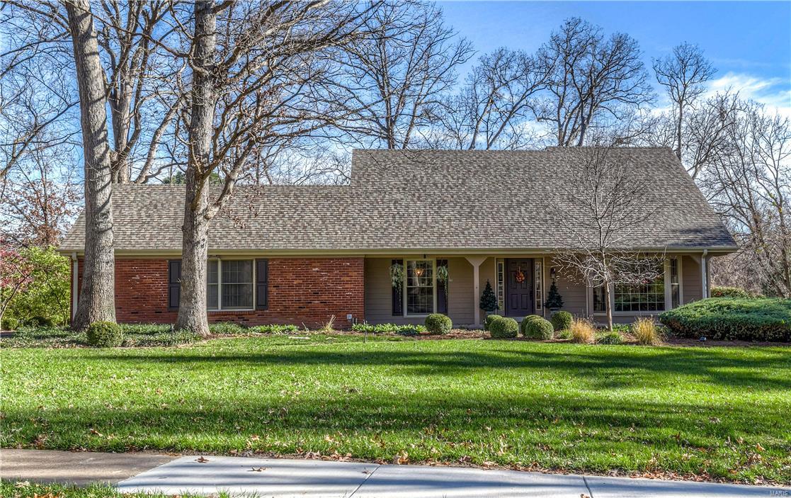 Gorgeous 1.5 story home on over an acre lot in the sought after Mason Valley subdivision & nationally ranked Parkway West school district.  This 4 bed/4 bath home has been updated throughout with a gourmet chef's kitchen featuring handmade tile backsplash, granite countertops, center island, & wet bar opening to the vaulted family room; main floor master suite; fantastic bathrooms; walkout finished lower level with a large rec room, kitchenette with granite & full size refrigerator, full bath, & office/exercise room; the exterior has been professionally landscaped & maintained featuring a sprinkler system & landscape lighting; All within walking distance to Queeny Park, a 569 acres retreat with walking & equestrian trails & a new dog park coming in the spring.  This is a must see!