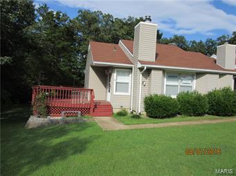 Great condo for golf, swimming, lake activities and beach area. Condo offers a newer bath, kitchen with newer cabinets, counters, sink and fixtures, full size stove and built-in microwave. Newer laminate wood flooring, laundry in unit, brick wood-burning fireplace with raised hearth, thermal tilt-in windows, 6 panel doors. Both bedrooms walk out to private rear decks and kitchen walks out to 14 x 24 deck. this end unit backs to common ground and wooded area. Walk to pool, playground, golf and club house. Location: End Unit, Ground Level