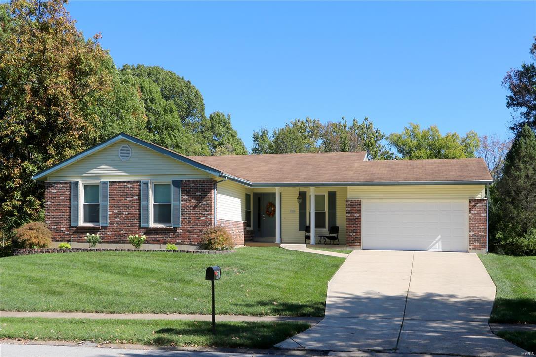 Here is your new home for the holidays!  Sprawling ranch located on a great lot backing to trees and common ground and a great location, conveniently located to 141 and highways, schools, restaurants, and shopping.  Inside you will love the newly installed hardwood flooring and fresh neutral paint throughout the living areas.  Four spacious bedrooms on the main floor, including a huge master bedroom and nice size closets.  Family room has floor to ceiling gas fireplace and sliding doors leads out to composite decking overlooking the awesome yard and view.  Large kitchen with abundance of custom cabinets, wood flooring and stainless appliances.   Walkout lower level includes rough in plumbing, cedar closet and framing for office and tons of room for storage and with your finishing touches more living space if needed.  Here’s a great chance for you to have new halls to deck for the holidays!