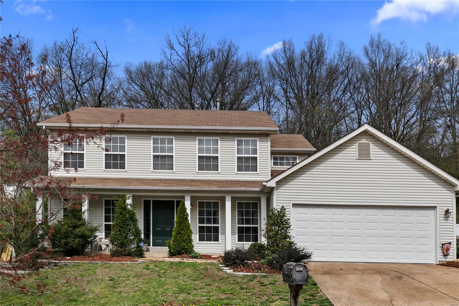 Highly desirable 2 story with large deck.  A big welcome to this amazing home in a spectacular subdivision where homes in here sell quickly.  March 2019 Interior painted Sherwin Williams in gray tones.  Formal living and dining rooms.  Living room opens to the family room highlighted with fireplace and large bay window overlooking a treed backyard- patio and deck.  Well appointed kitchen and adjoining  separate laundry room with cabinetry.  Show stopping high volume vaulted master bedroom suite-a Wow factor in a 2 story home, walk in closet.  The large luxury master bath boasts a separate tub and shower, double sinks.  Impressive Updates include:  February 2019 garage door, 2014 roof, 2018 stove, dishwasher less than 2 years old.  This is a must see!